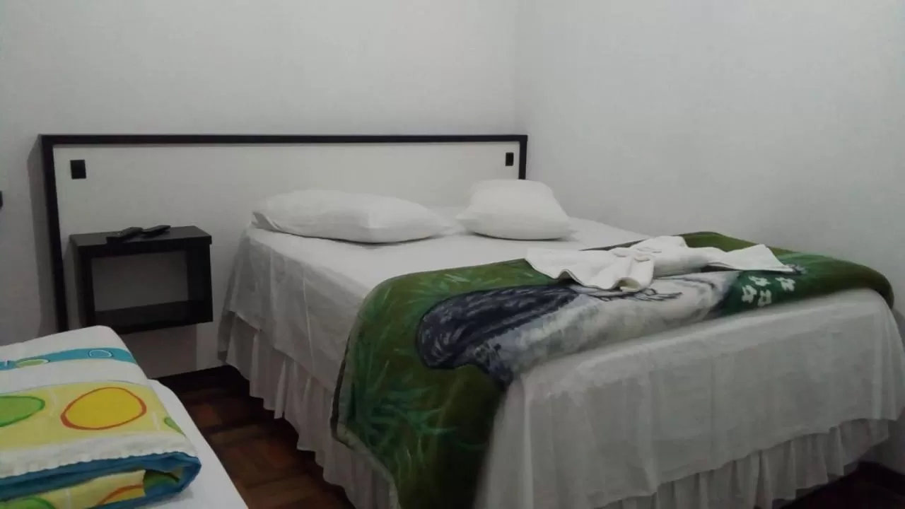 Bed in Urussanga Hotel