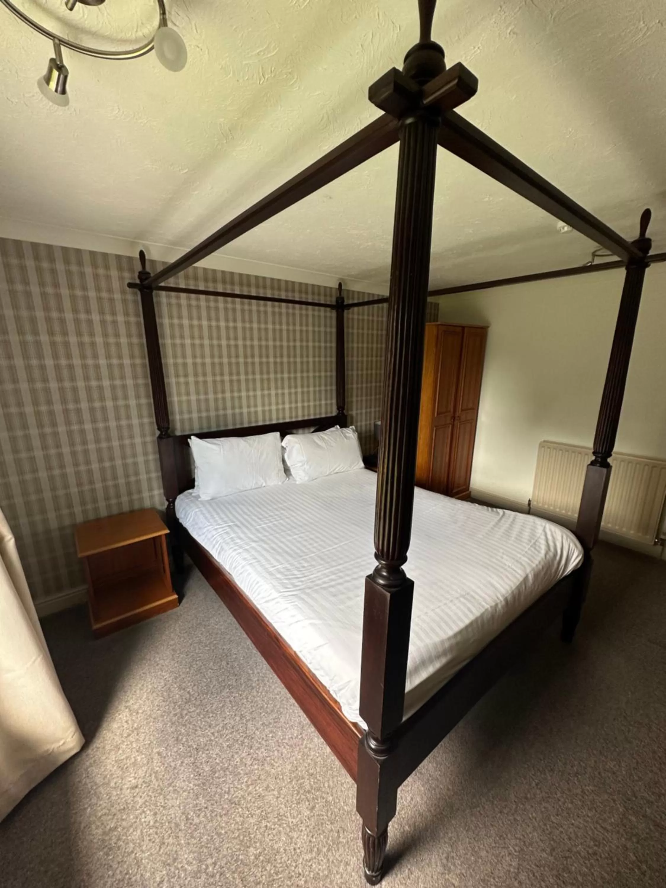 Bedroom in The Gables Hotel