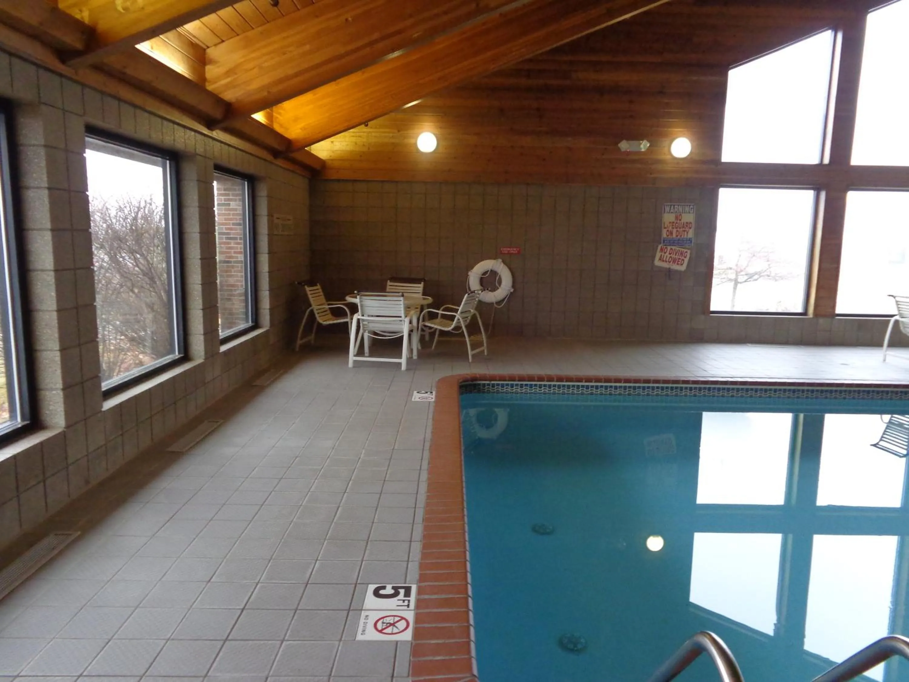 Swimming pool in AmericInn by Wyndham Coralville