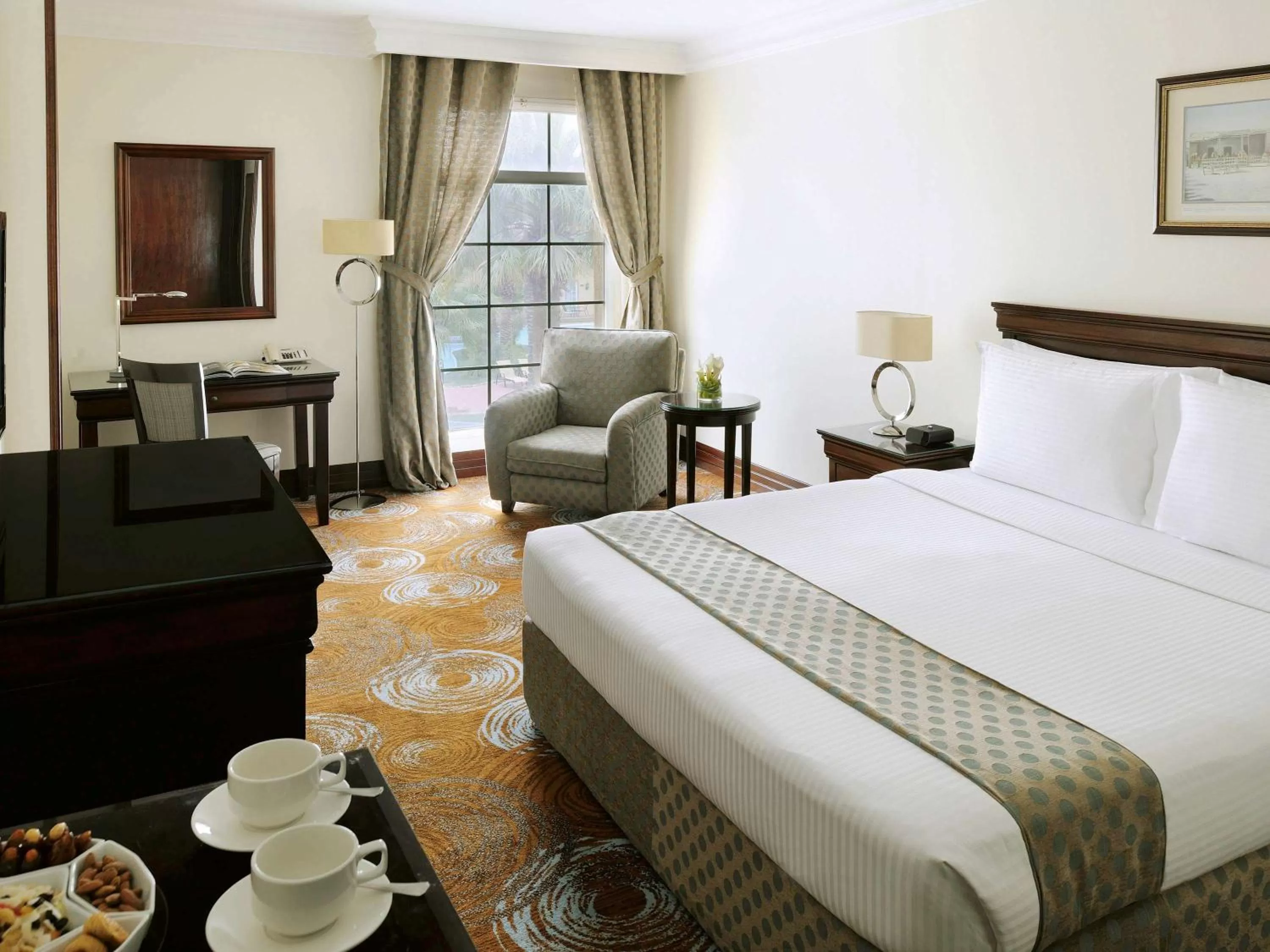 Photo of the whole room, Bed in Mövenpick Hotel Kuwait