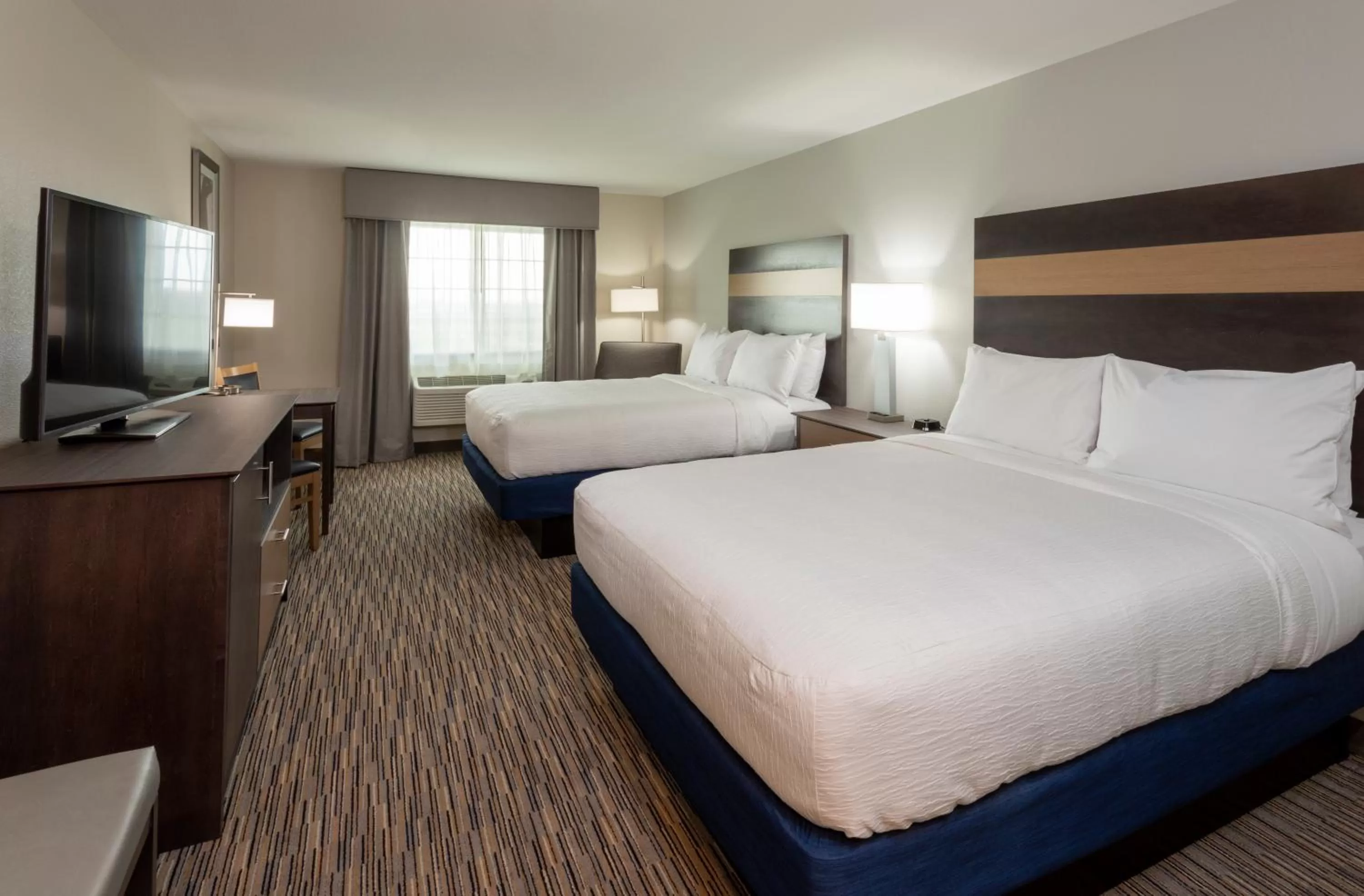 Photo of the whole room, Bed in GrandStay Hotel & Suites