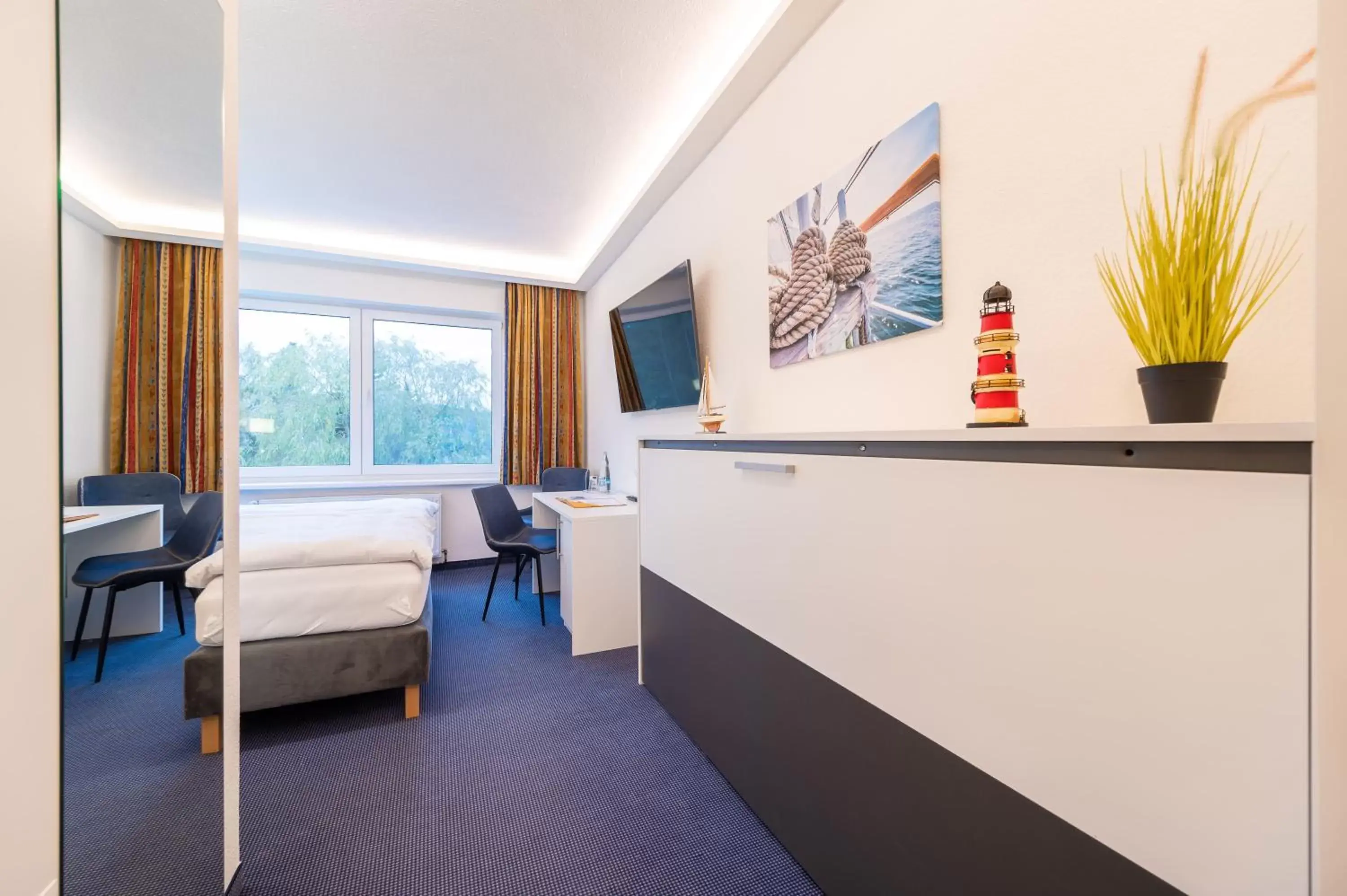 Comfort Triple Room in Hotel Mukran Comfort Triple Room in Hotel Mukran