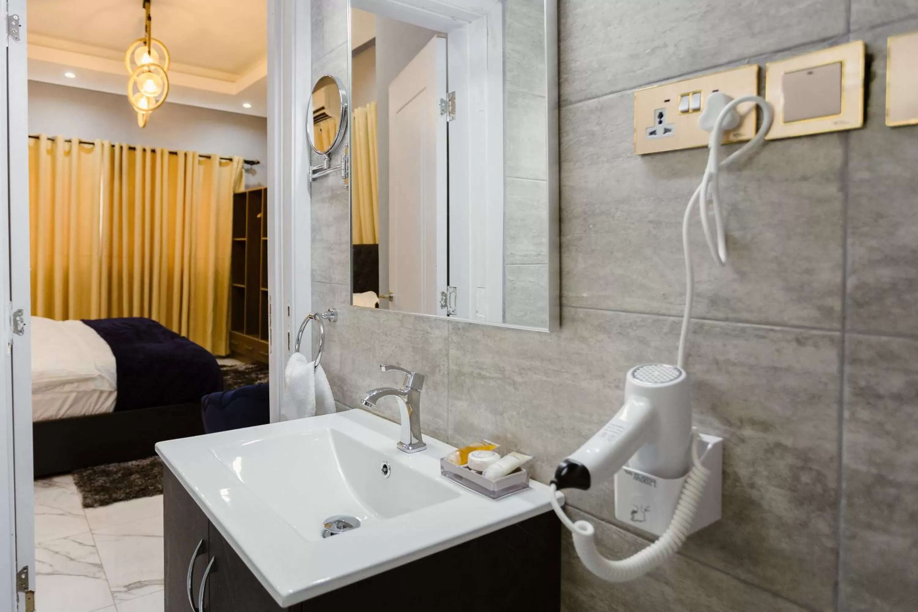 Bed, Bathroom in The Avery Suites, East Legon