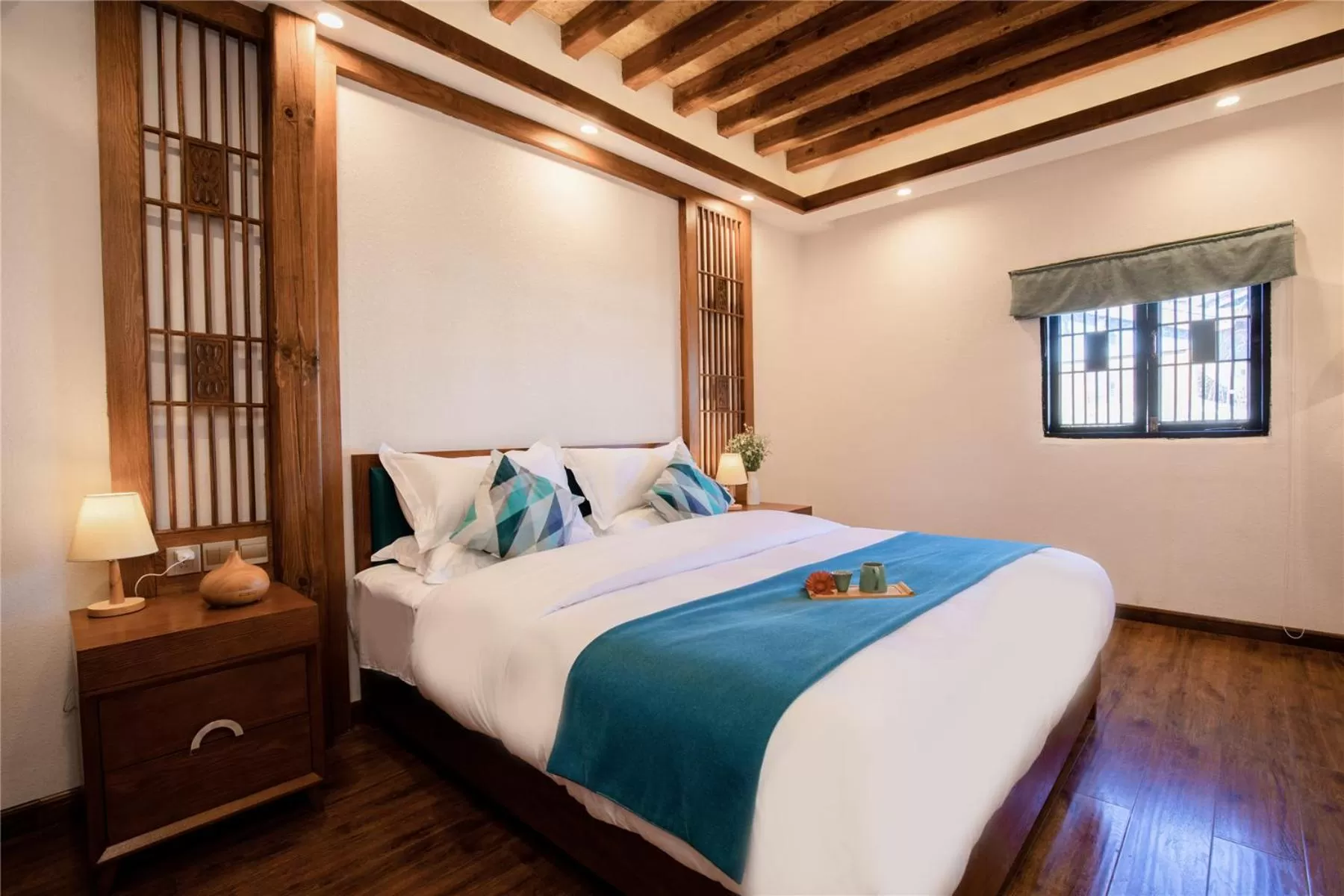 Bed in Lijiang Gemmer Hotel