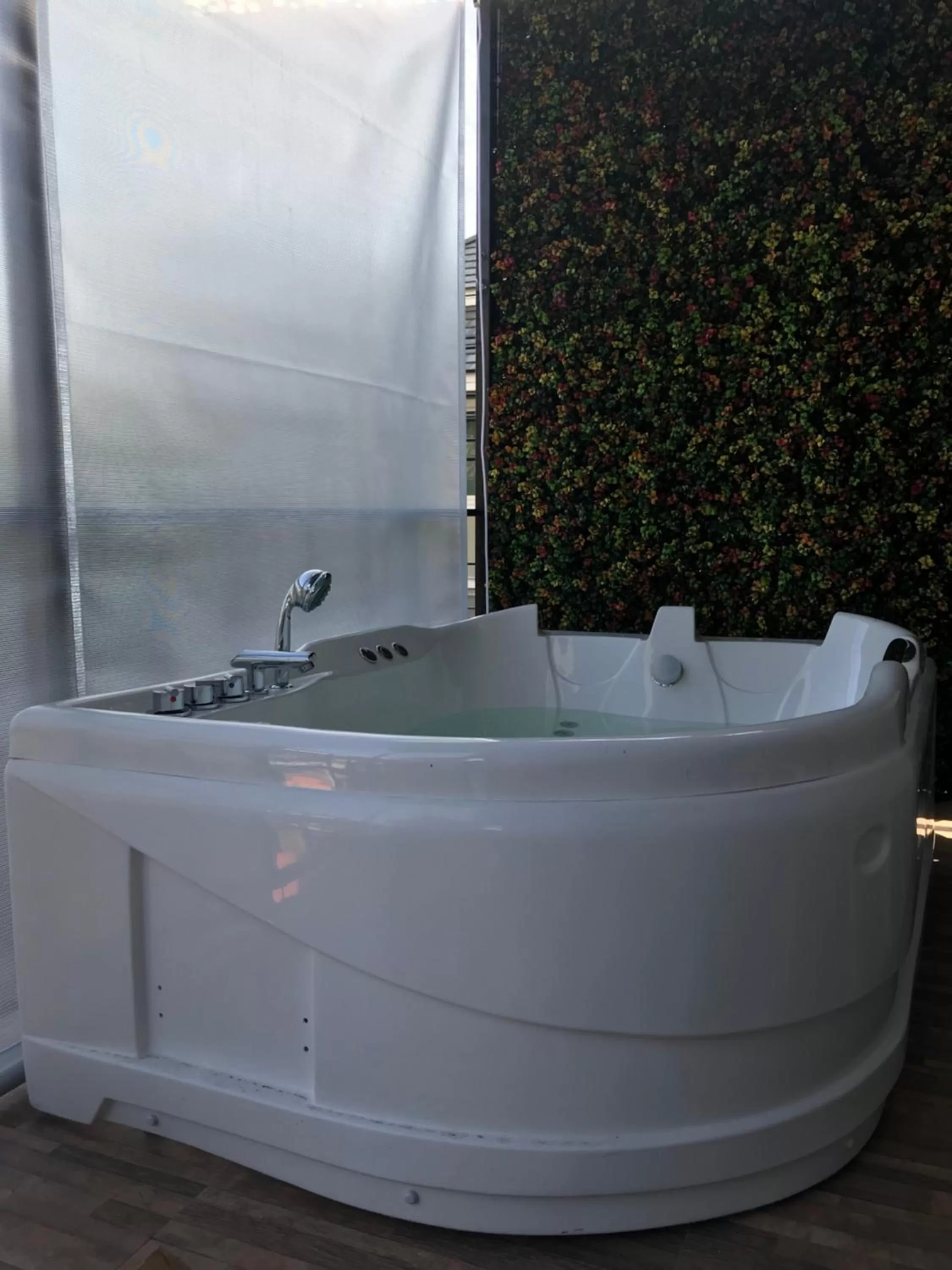 Bathroom in V20 Boutique Jacuzzi Hotel