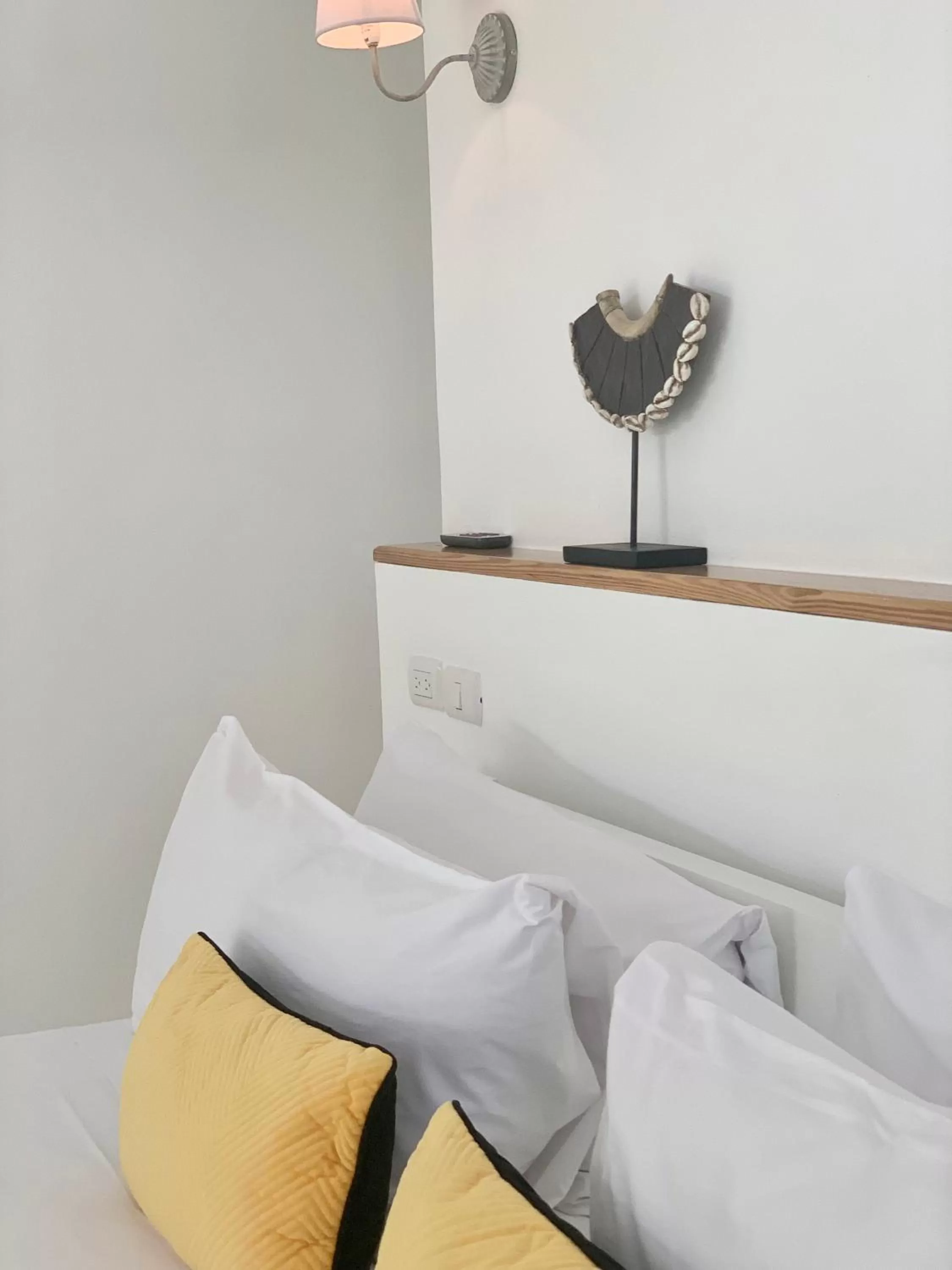 Bed in PUNTA POPY BOUTIQUE HOTEL - Adults Only