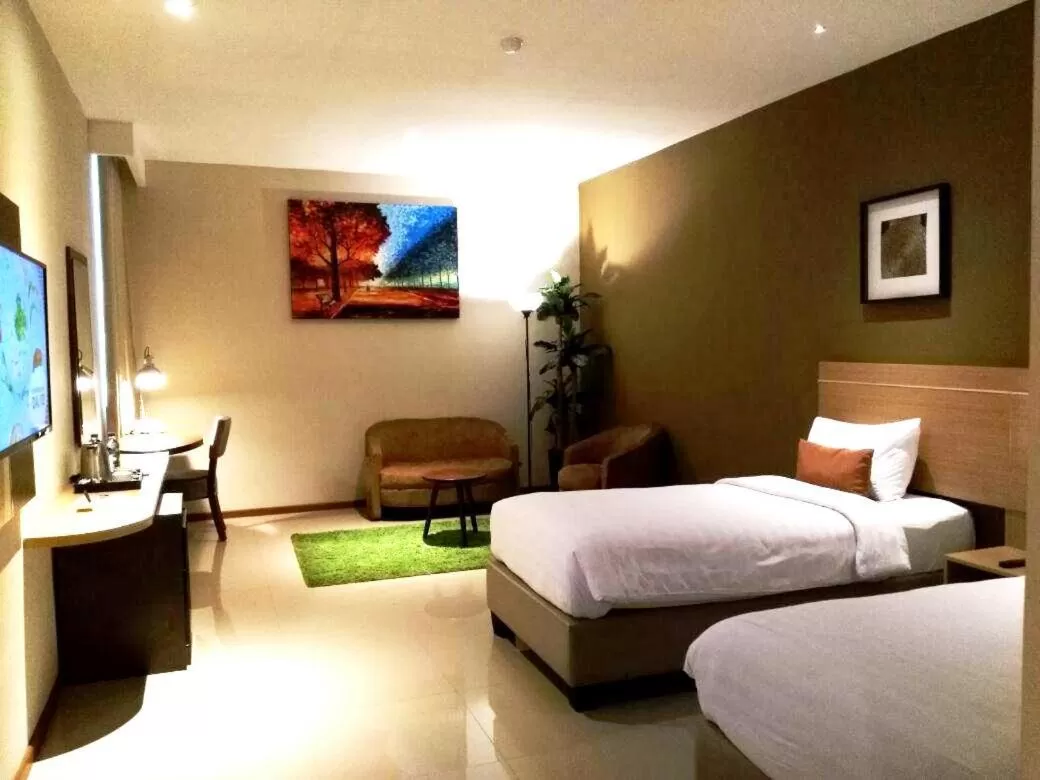 Bed in De Laxston Hotel Yogyakarta, Azana Hotels Collection