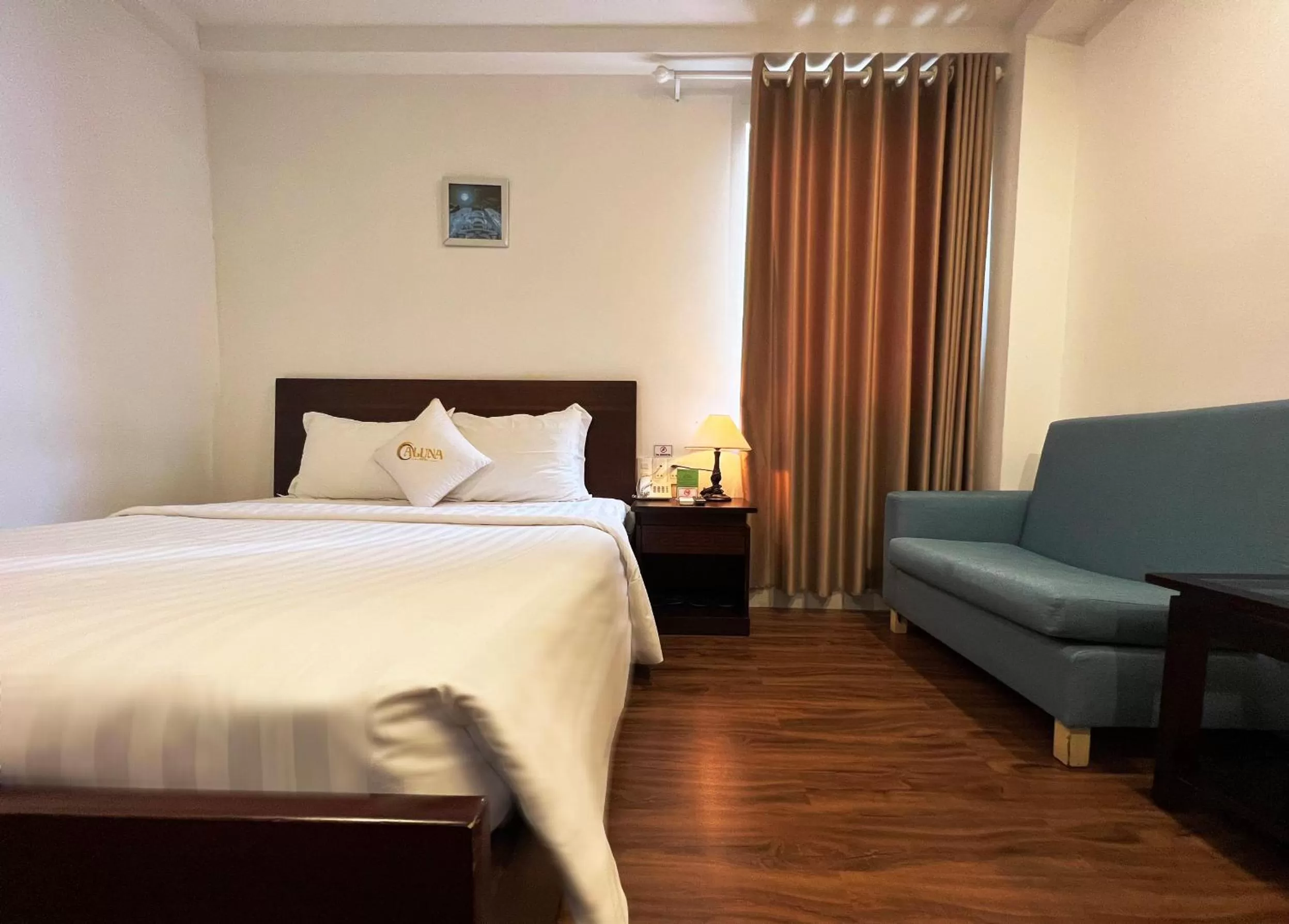 Bed in ALUNA Ben Thanh Hotel