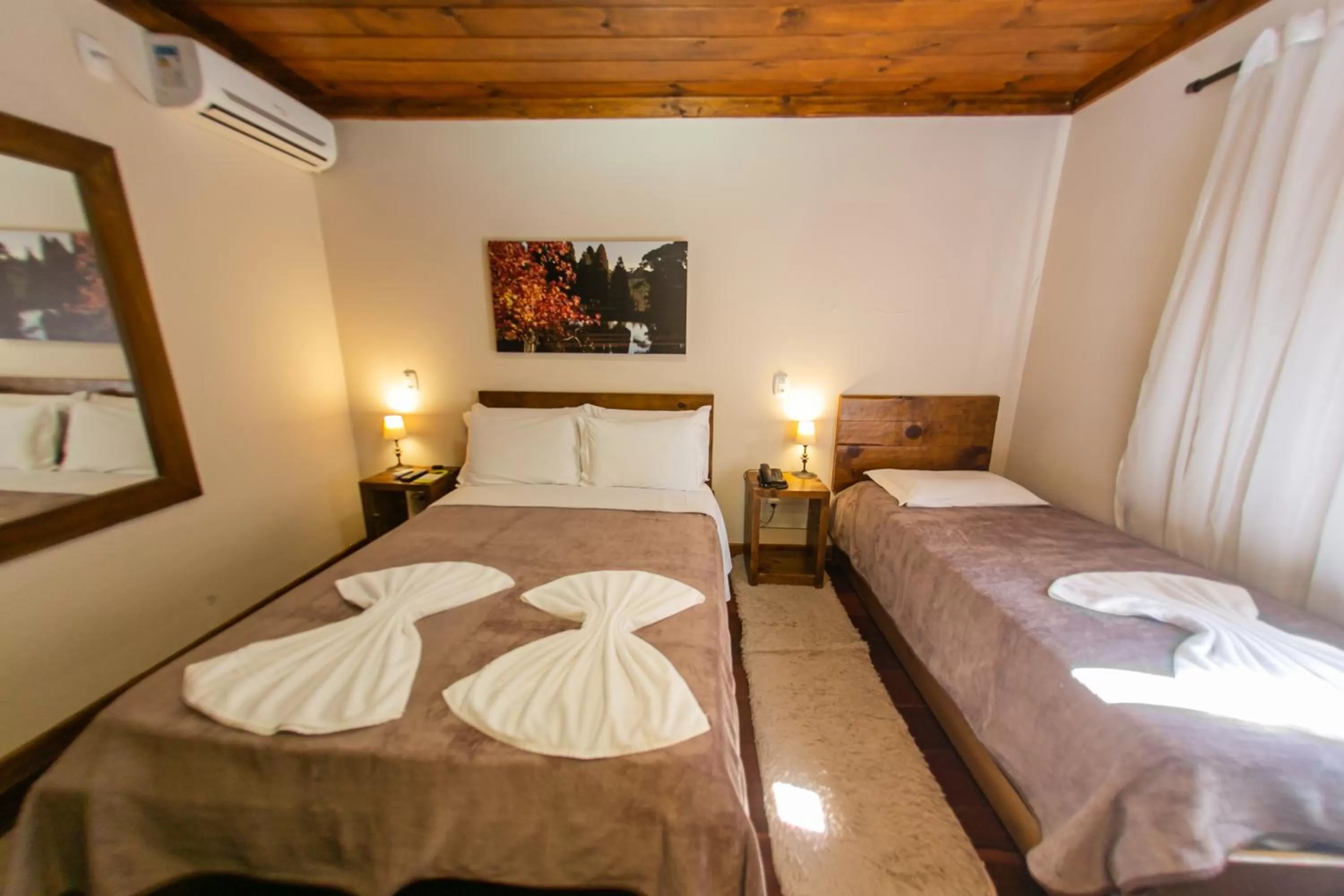 Bed in Pousada Charm Canela