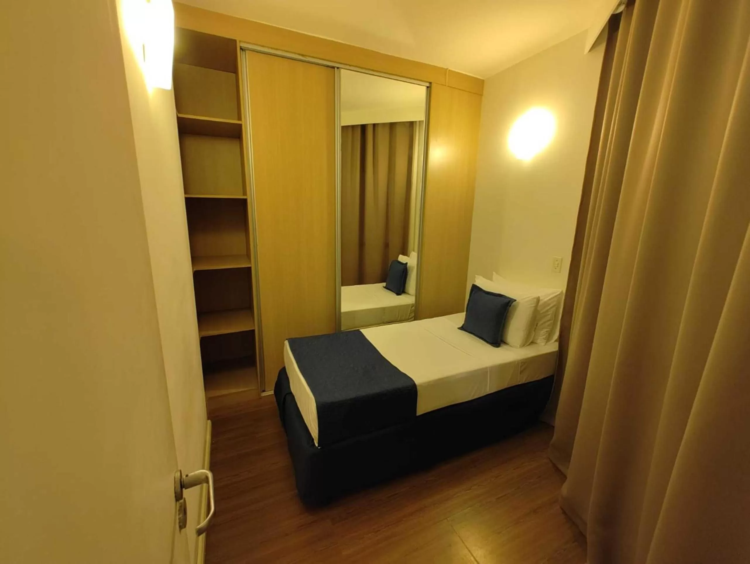 Photo of the whole room, Bed in Summit Suítes Hotel Santos