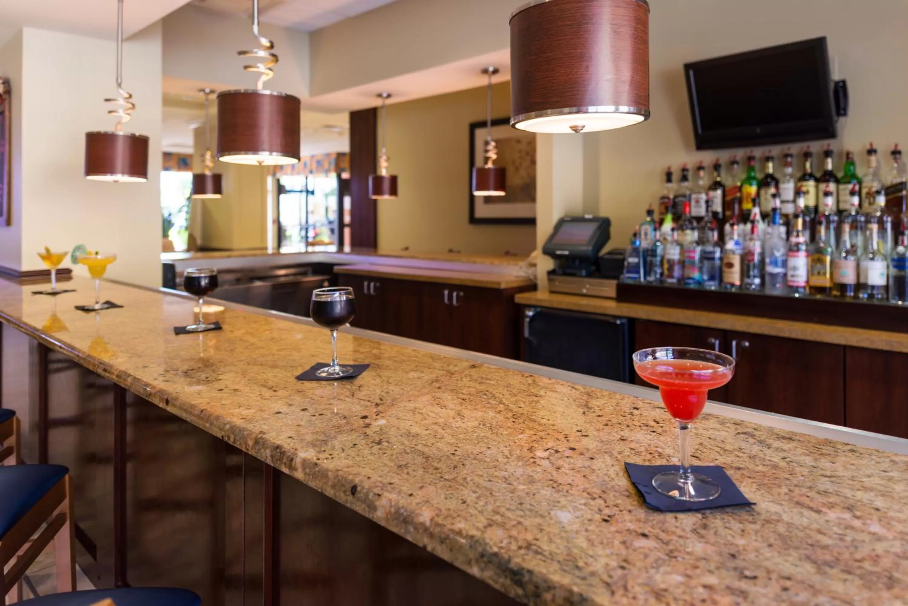 Lounge or bar in Holiday Inn & Suites Orlando SW - Celebration Area by IHG