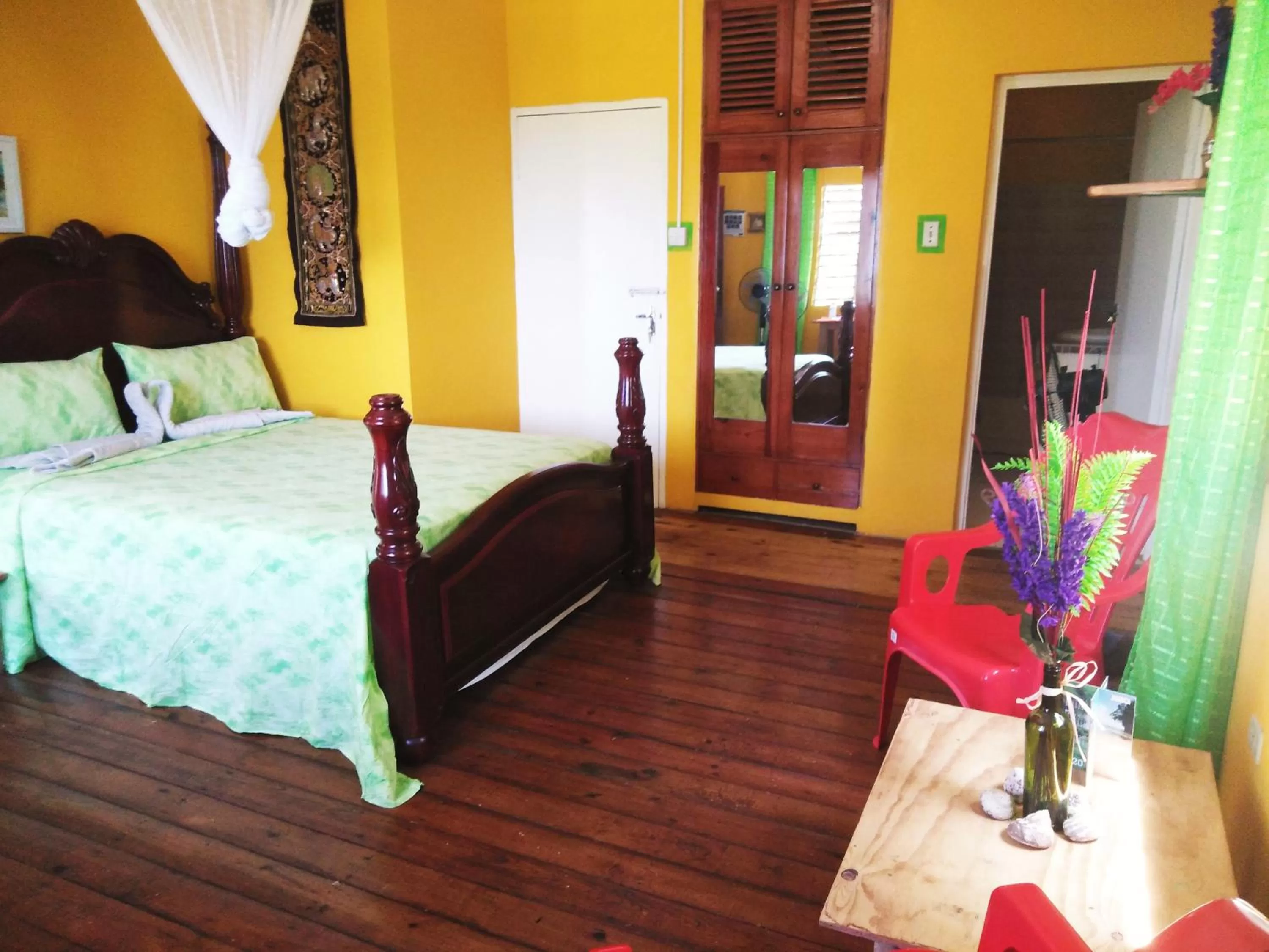 Bed in TOGA GUEST HOUSE