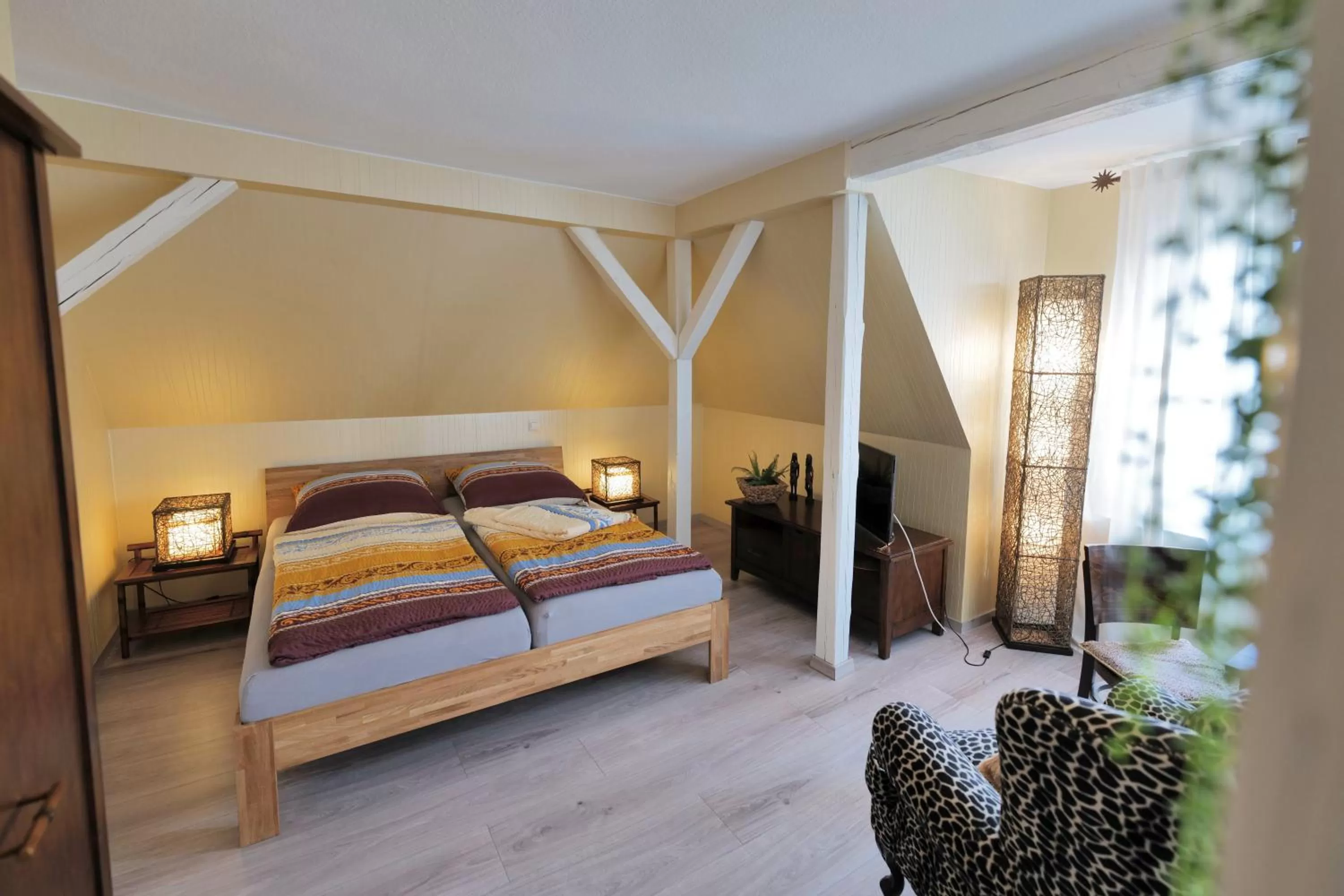 Bed in Elena Kempf Haaratelier & Guesthouse