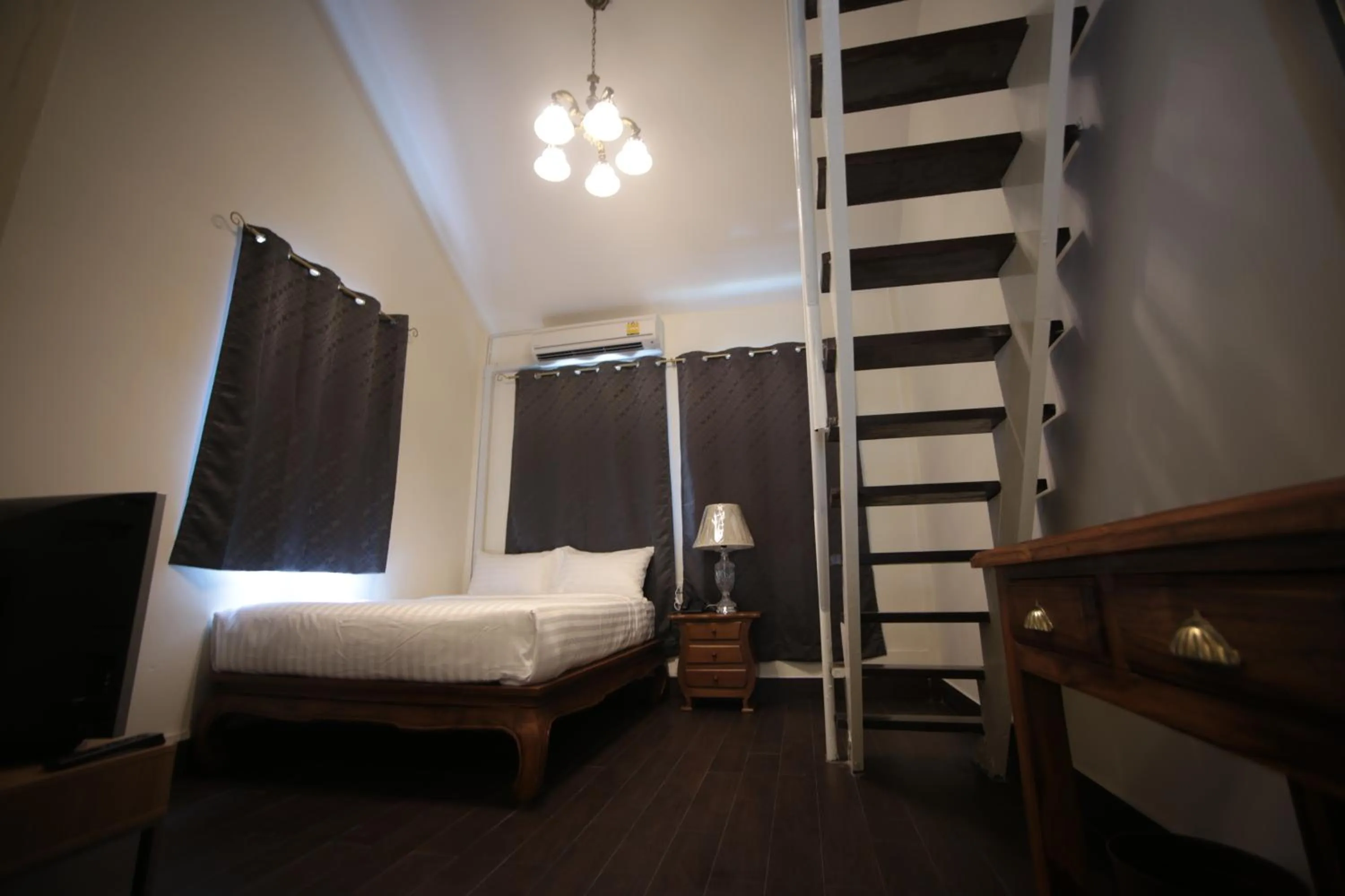 Photo of the whole room, Bed in The Myth - Sud Sathorn