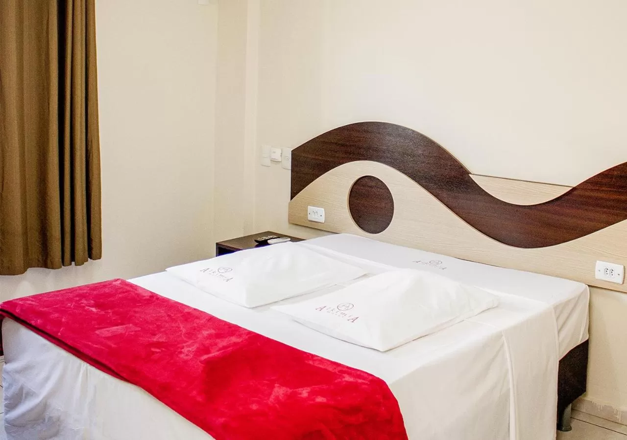 Bed in Alkimia Hotel