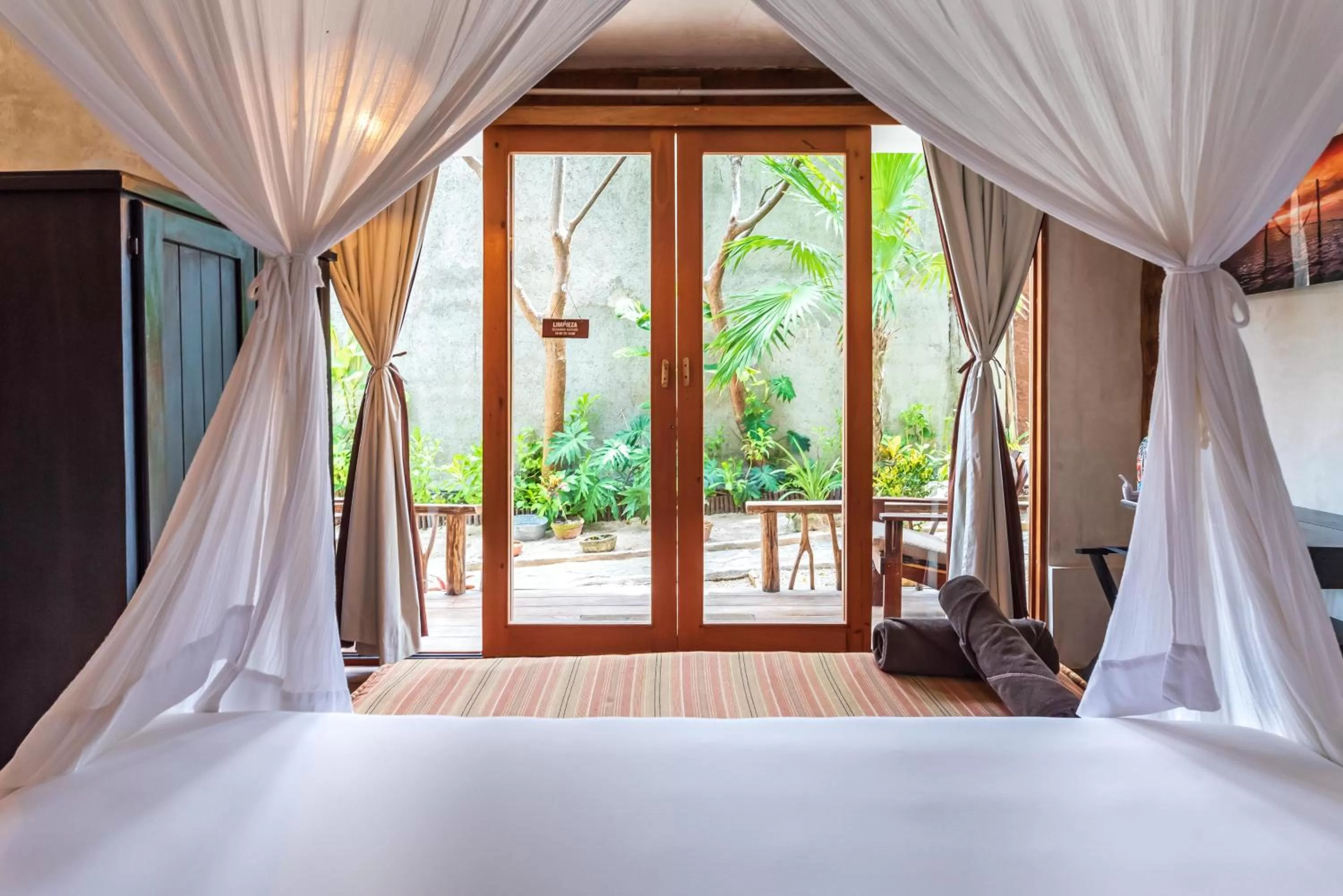 Balcony/Terrace, Bed in Casa Ganesh Tulum-Beachfront hotel by Ahau Collection
