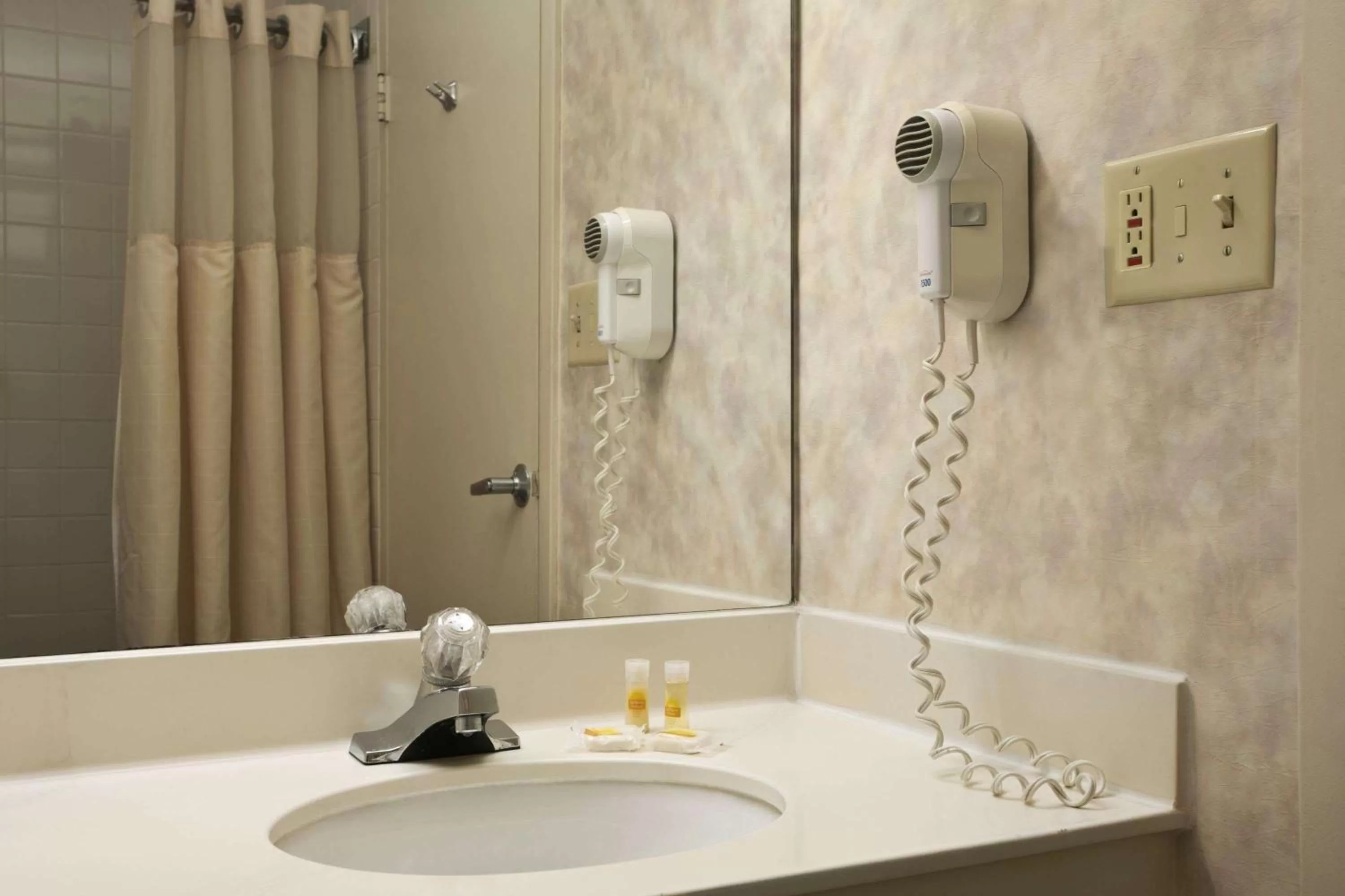 Bathroom in Days Inn by Wyndham Sidney OH