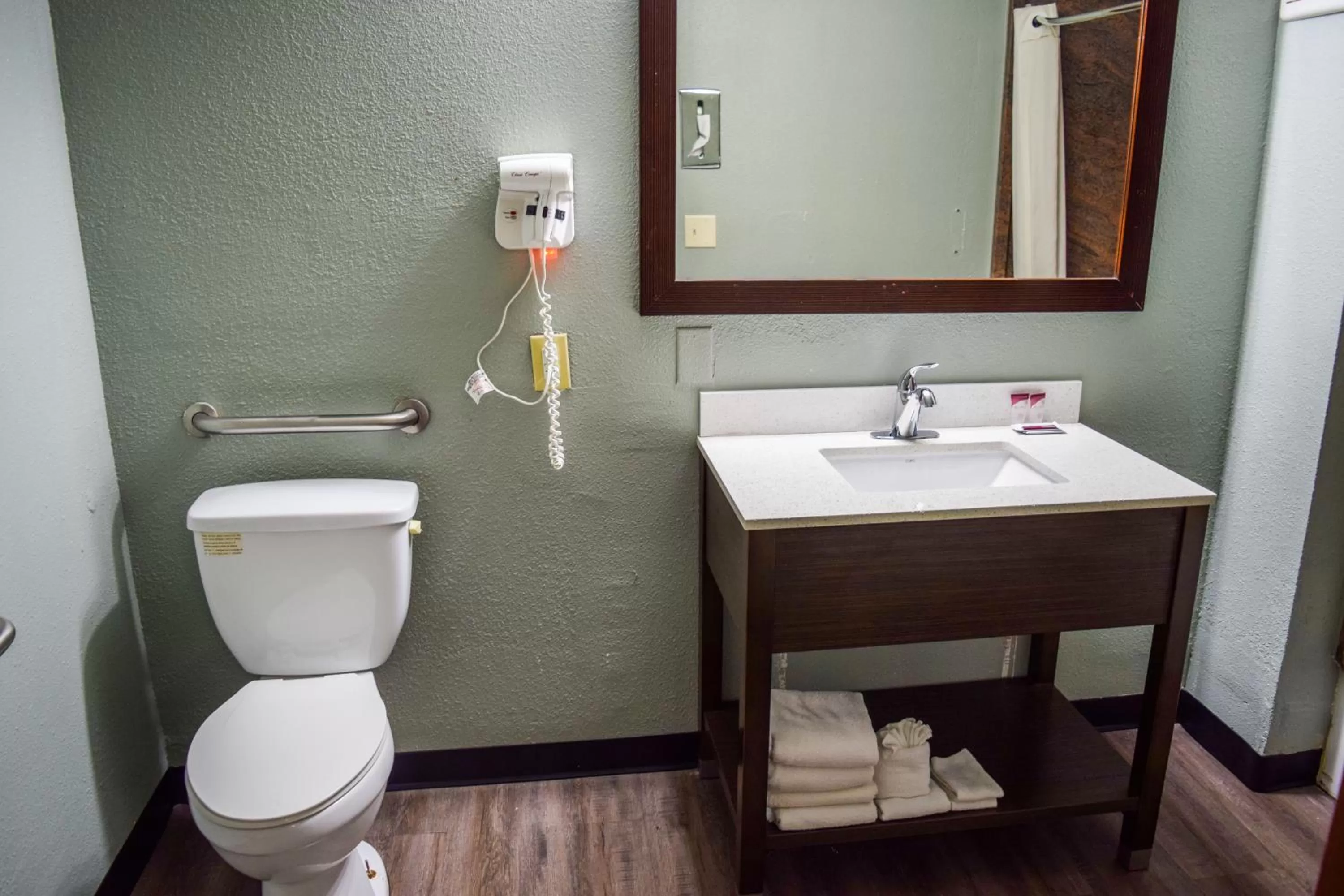 Toilet in Super 8 Downtown Raleigh