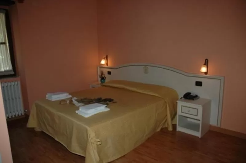 Bed in Albergo Montenerone