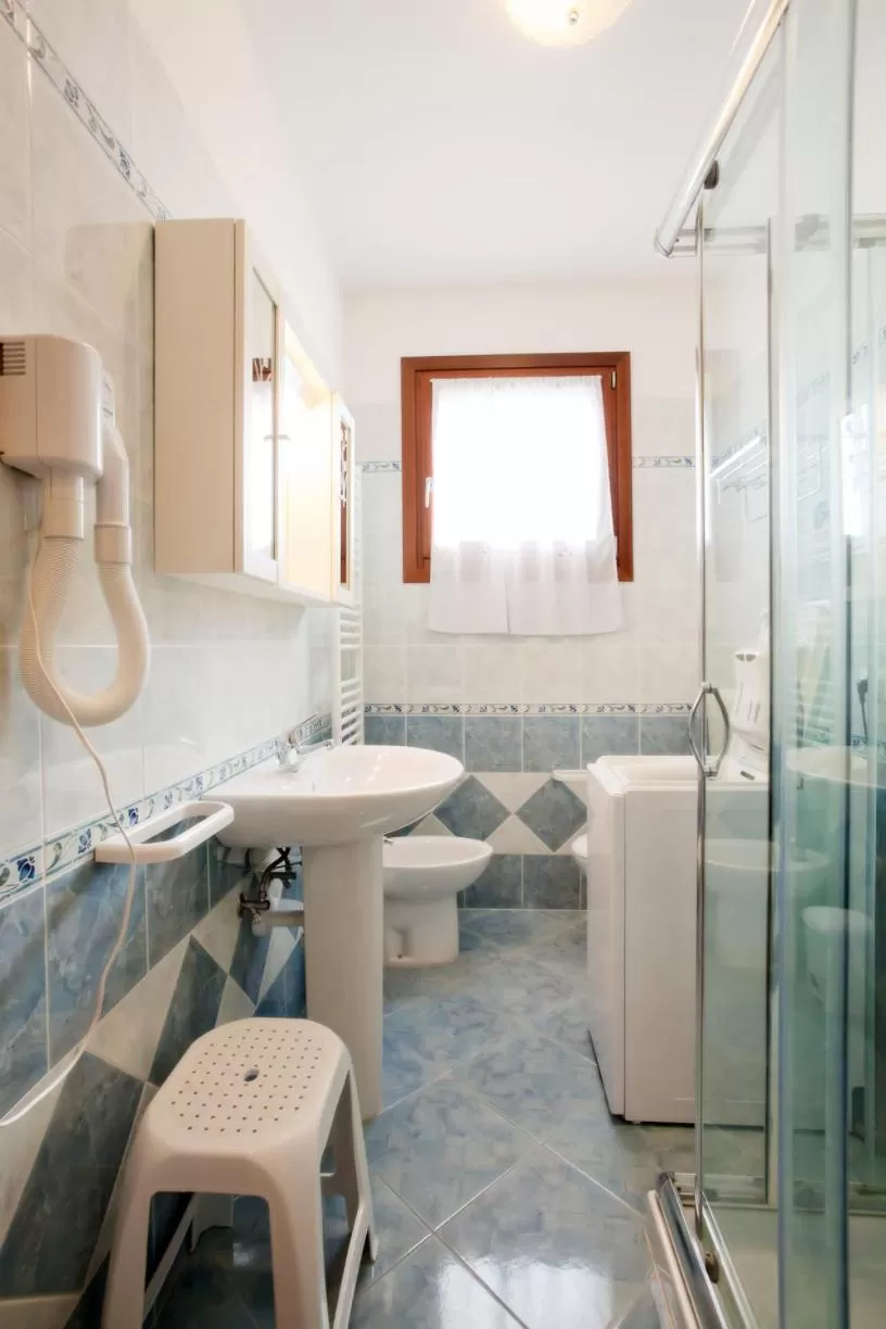 Bathroom in Villaggio dei Fiori Apart- Hotel 3 Stars - Family Resort