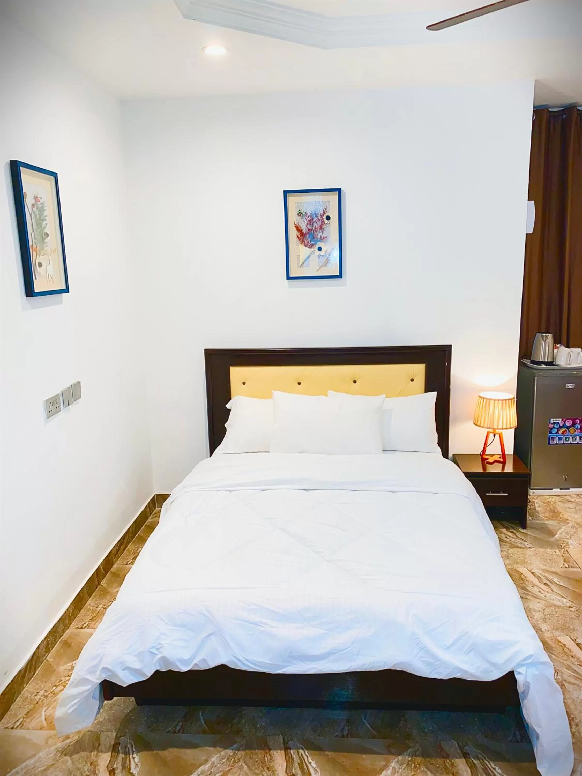 Bed in AIDEN HOMES AND APARTMENTS