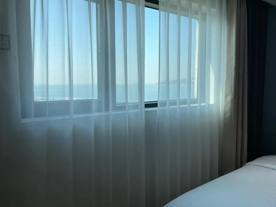 View (from property/room), Bed in Sea Moon Tourist Hotel
