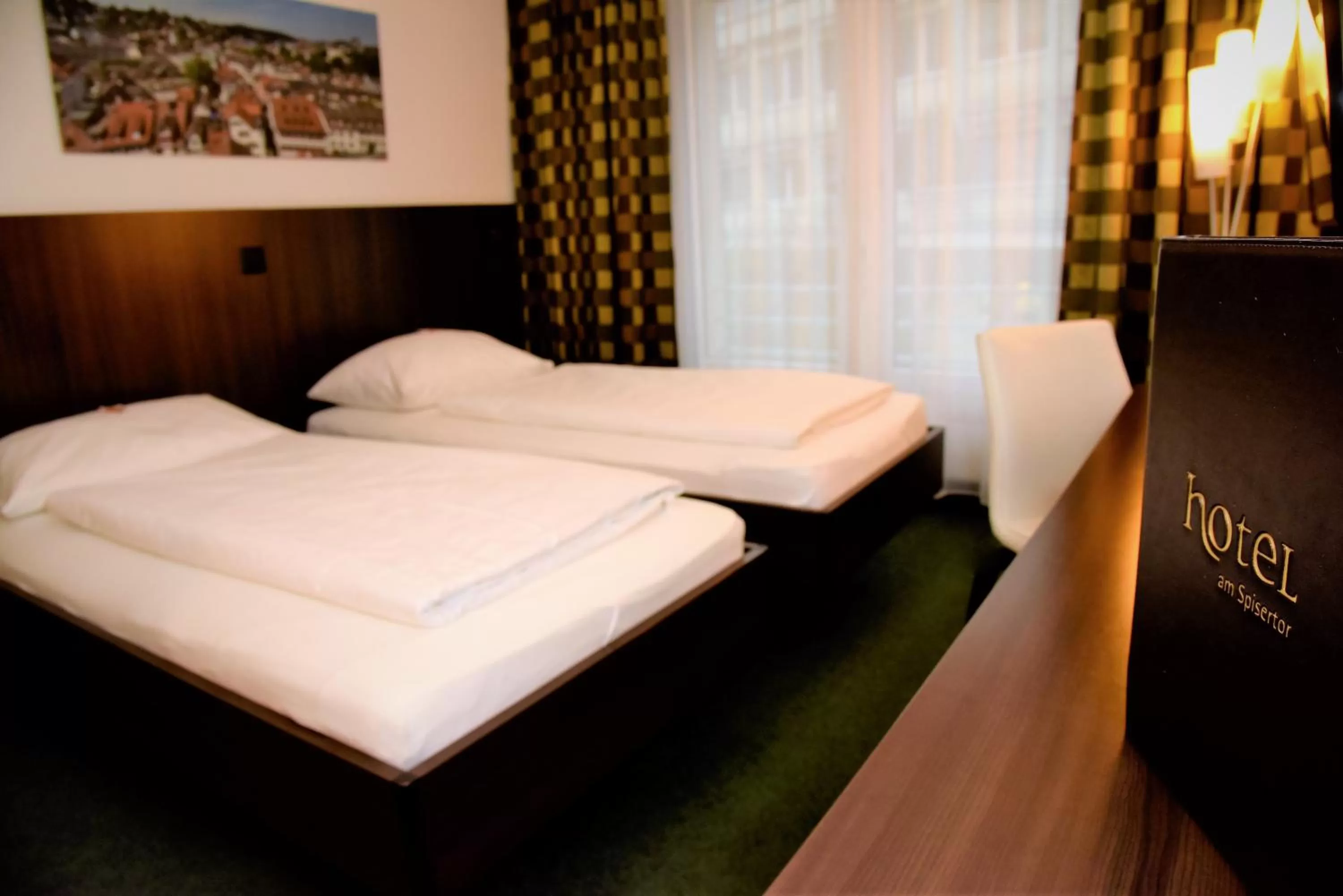 Bed in Hotel am Spisertor