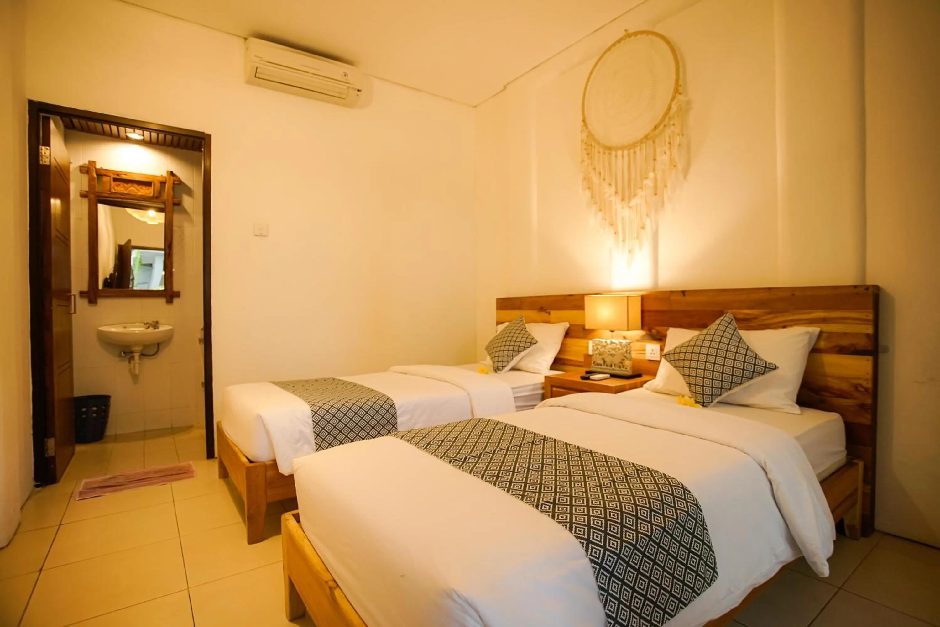 Bed in The Kubu Hotel