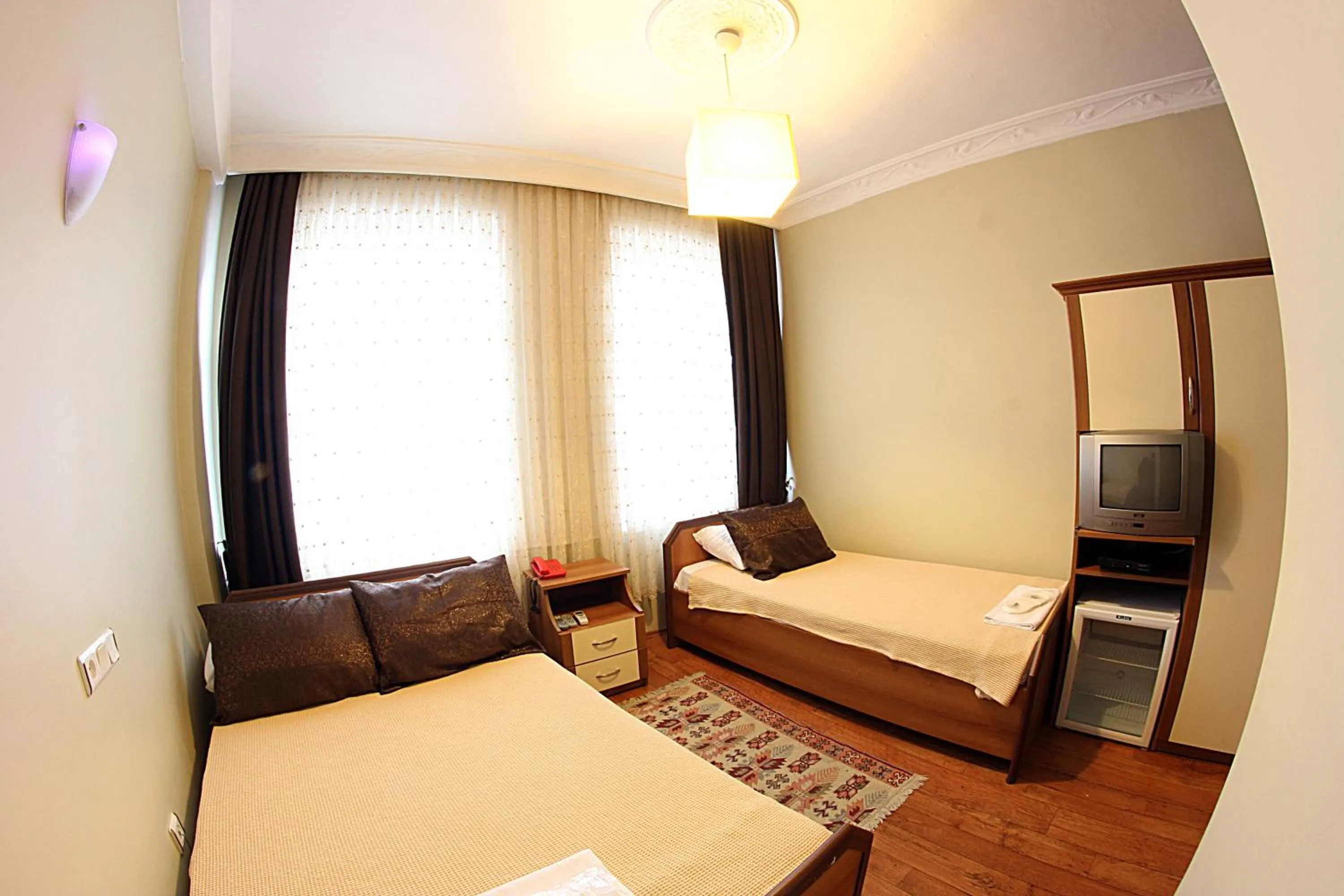 Photo of the whole room, Bed in Paradise Hotel