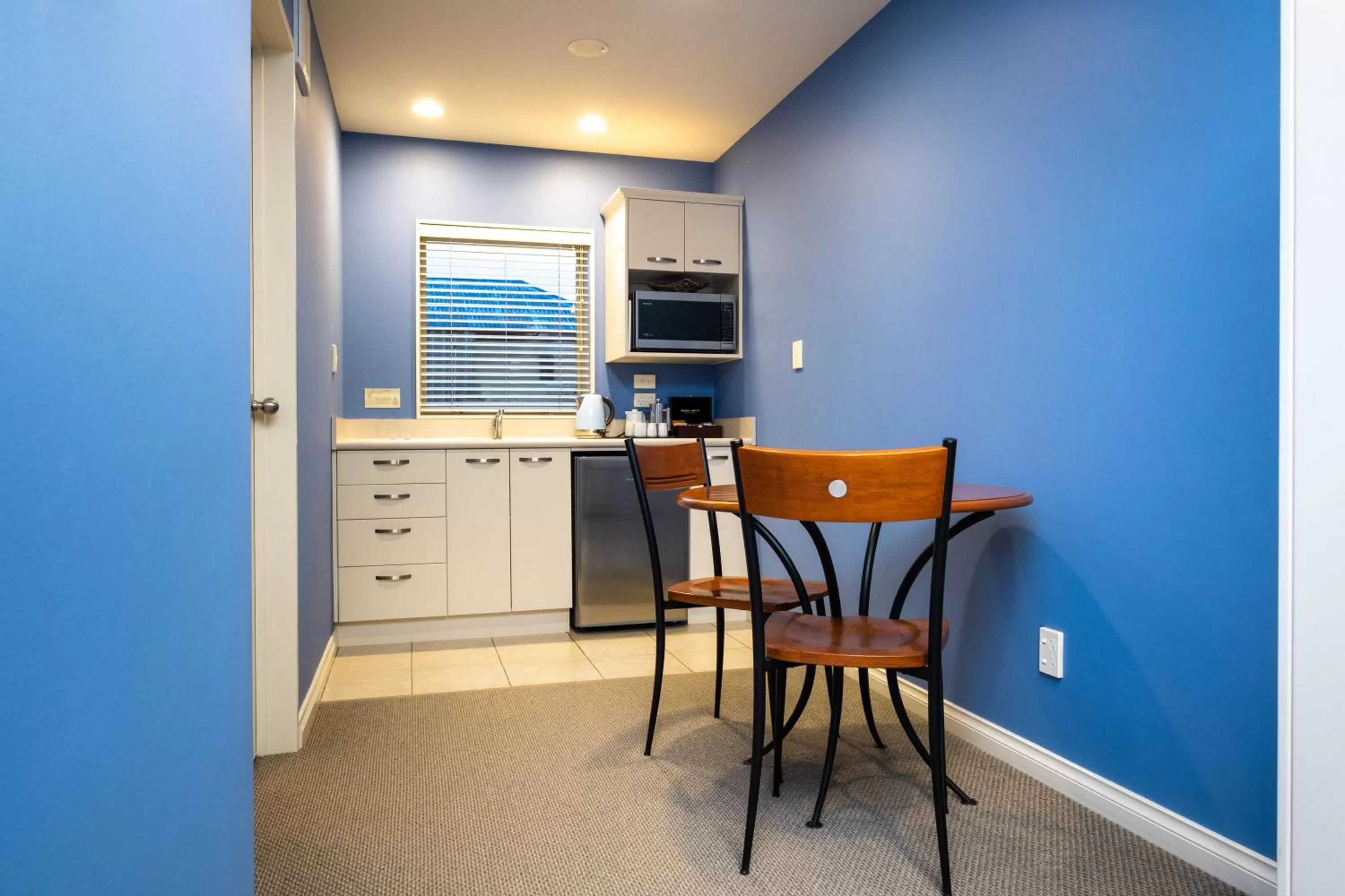 Kitchen or kitchenette in Motel de la Mer