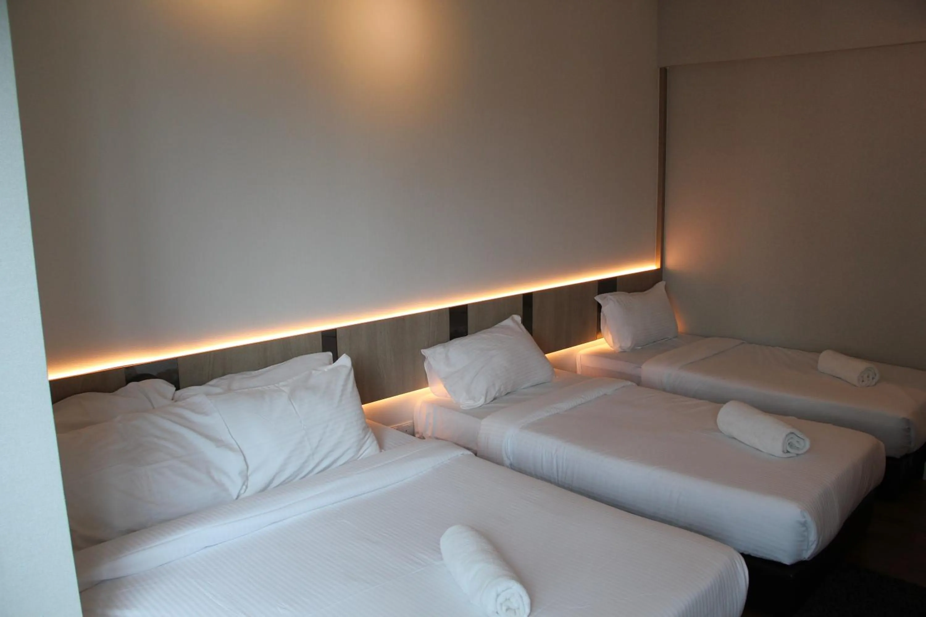 Bed in Summer Suites Residences by Subhome