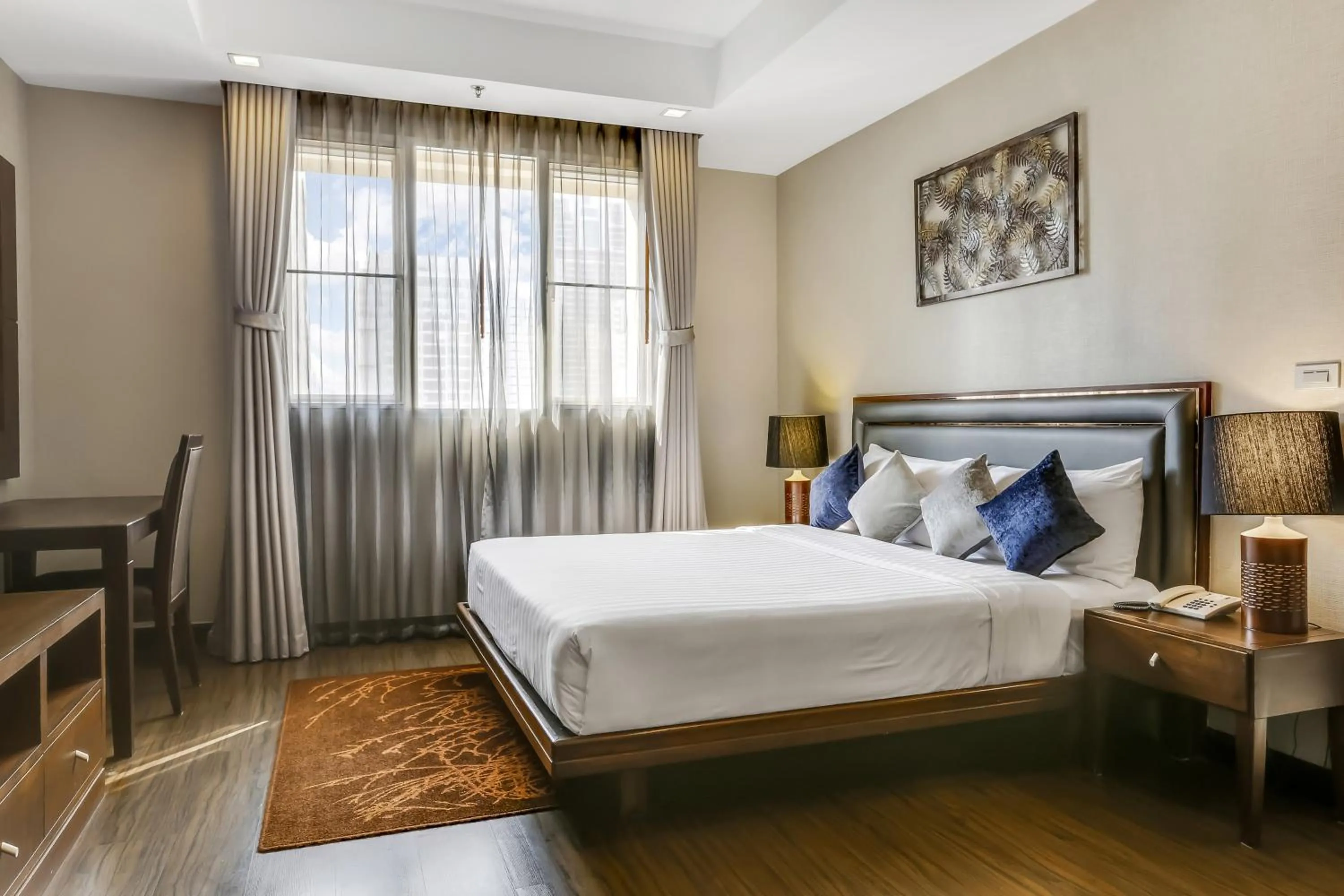 Bed in Grand Mercure Bangkok Asoke Residence