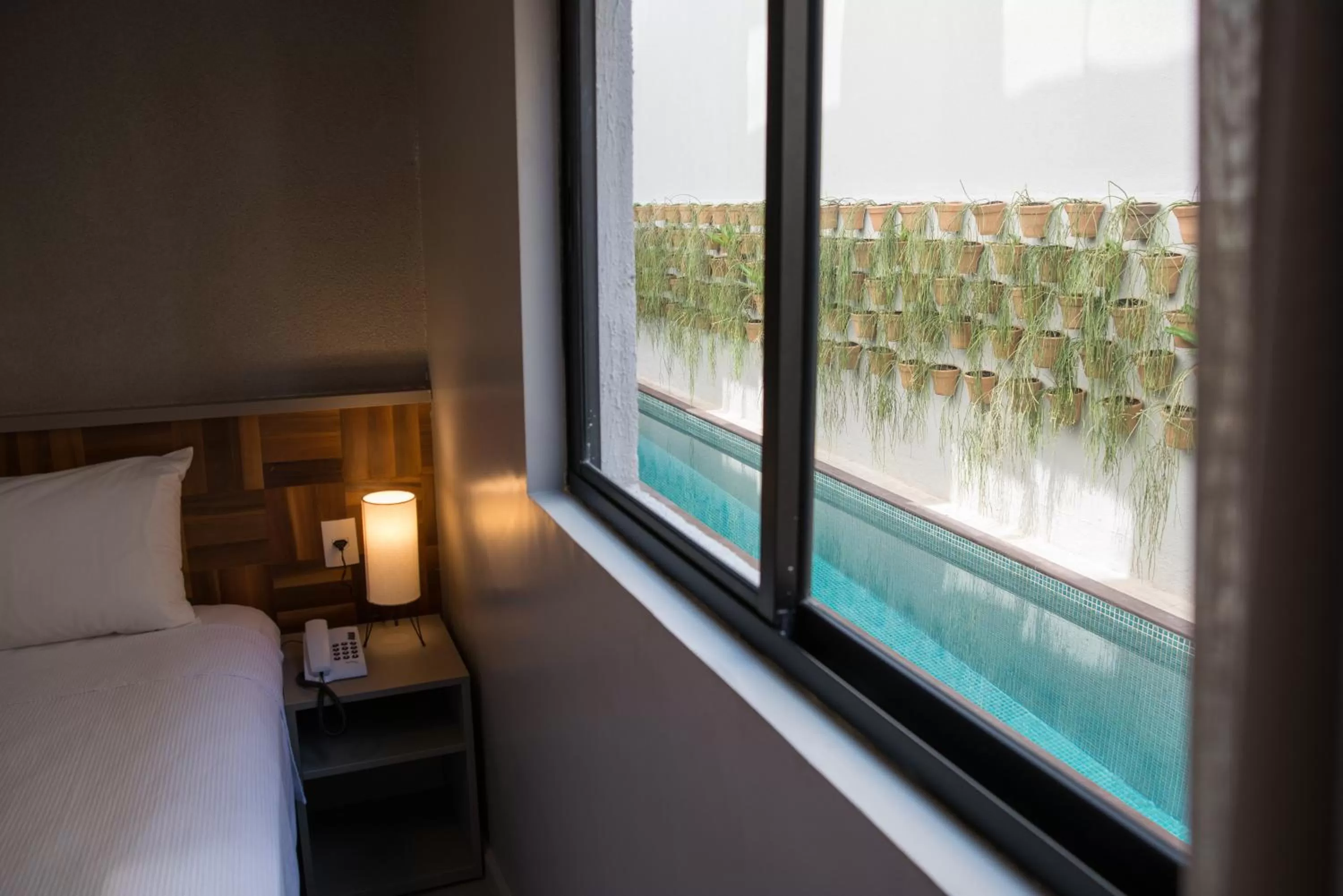 Bedroom, Bed in Amenit Hotel