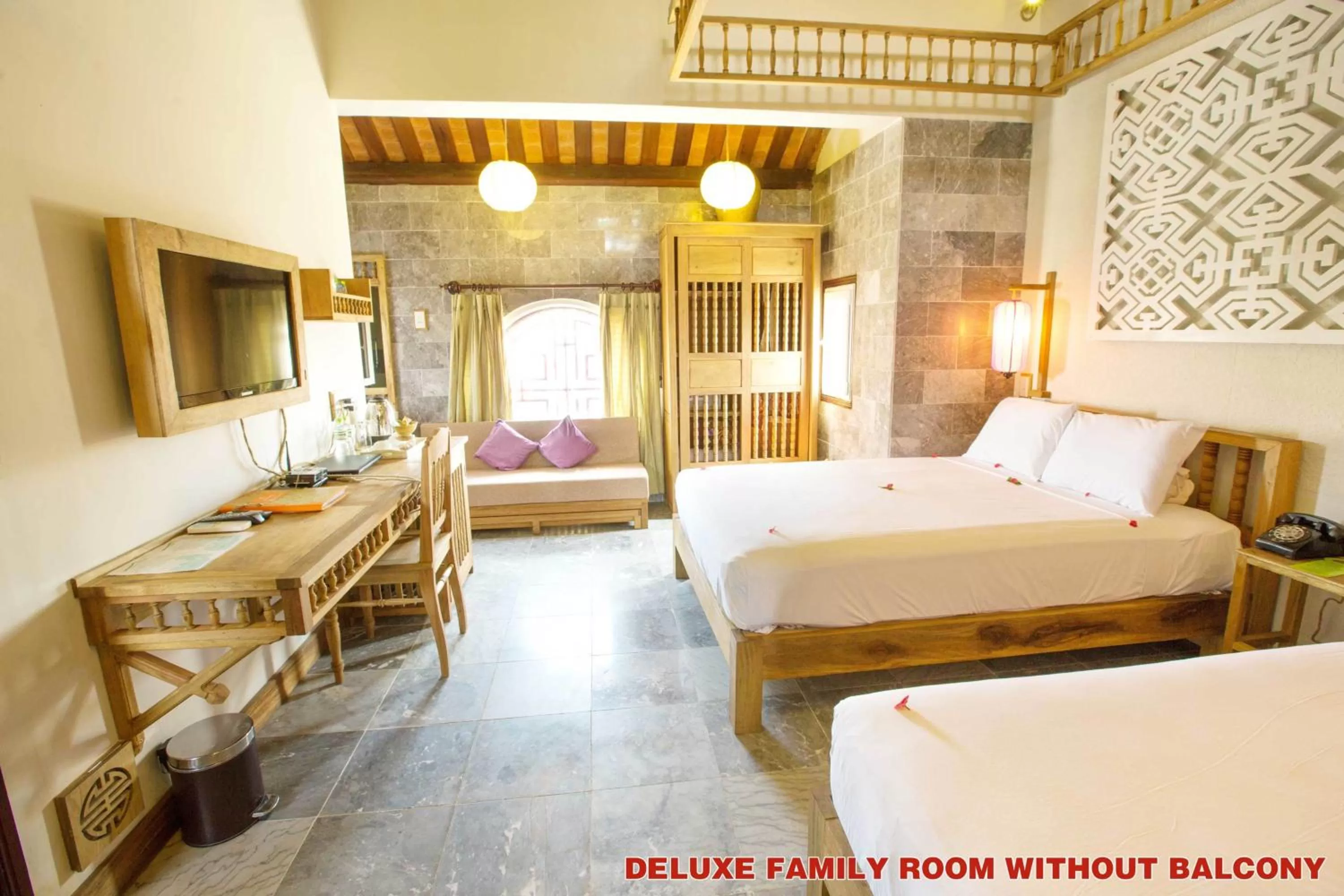 Bed in Hoi An Pho Library Hotel