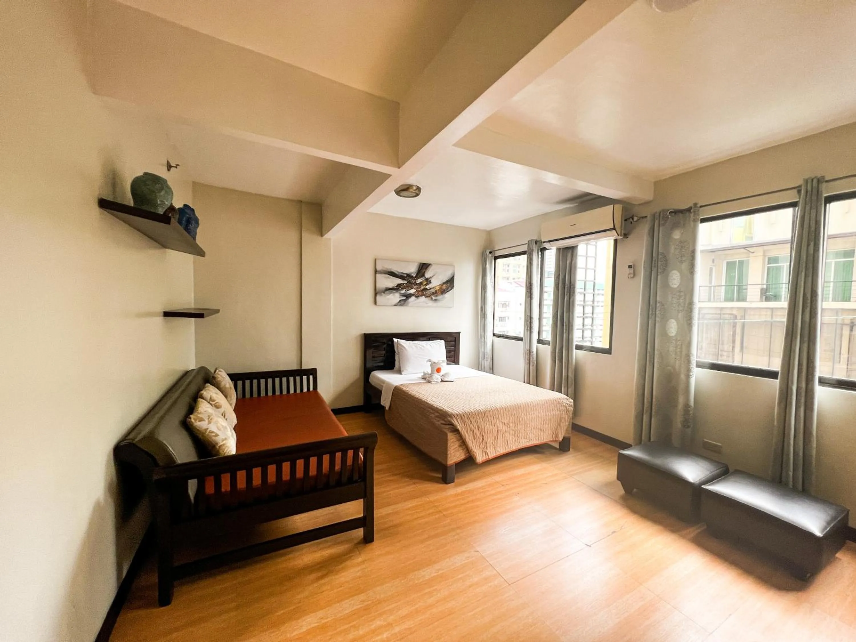 Bed in Stone House Hotel Manila