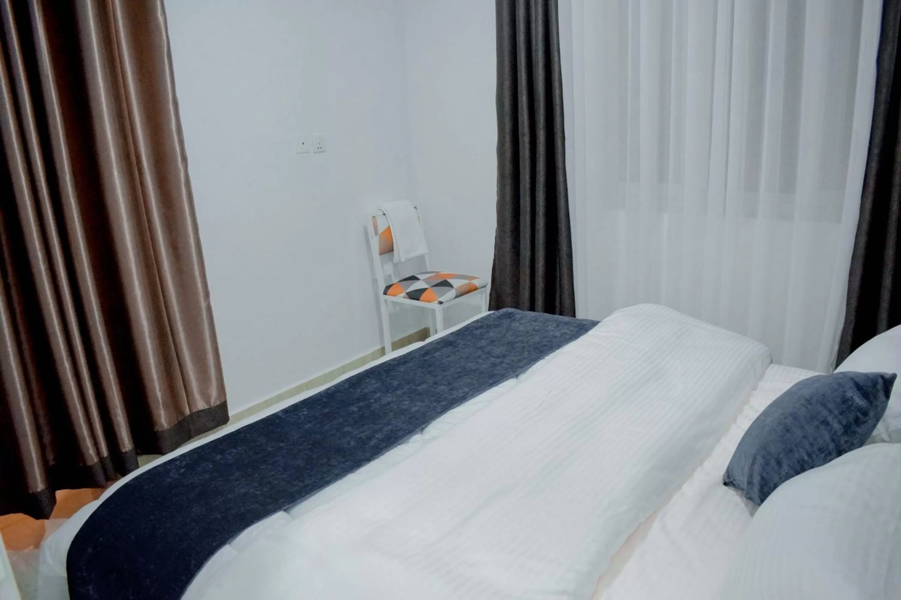 Bed in INZOZI AFRICA HOUSE B&B-Gishushu