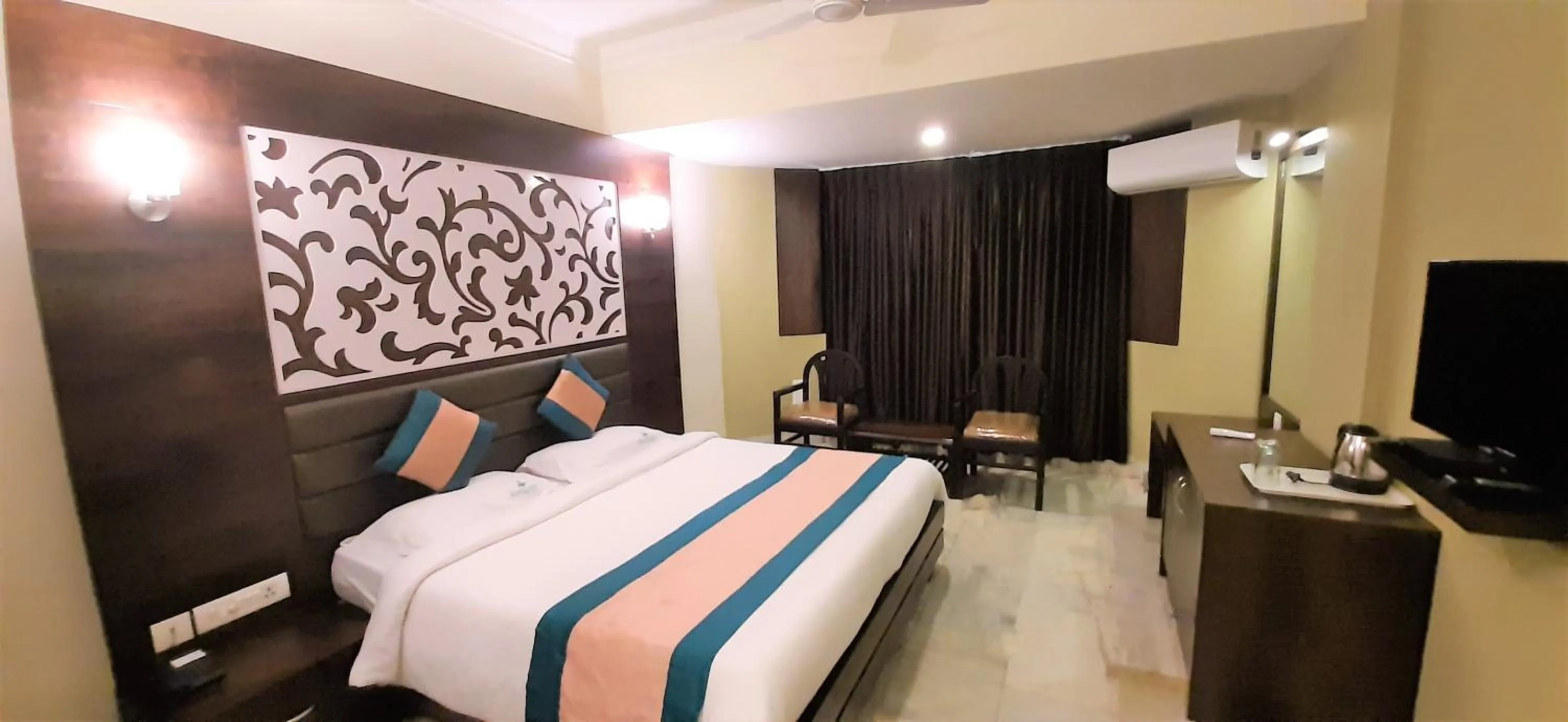 Bed in Hotel Mangalore International