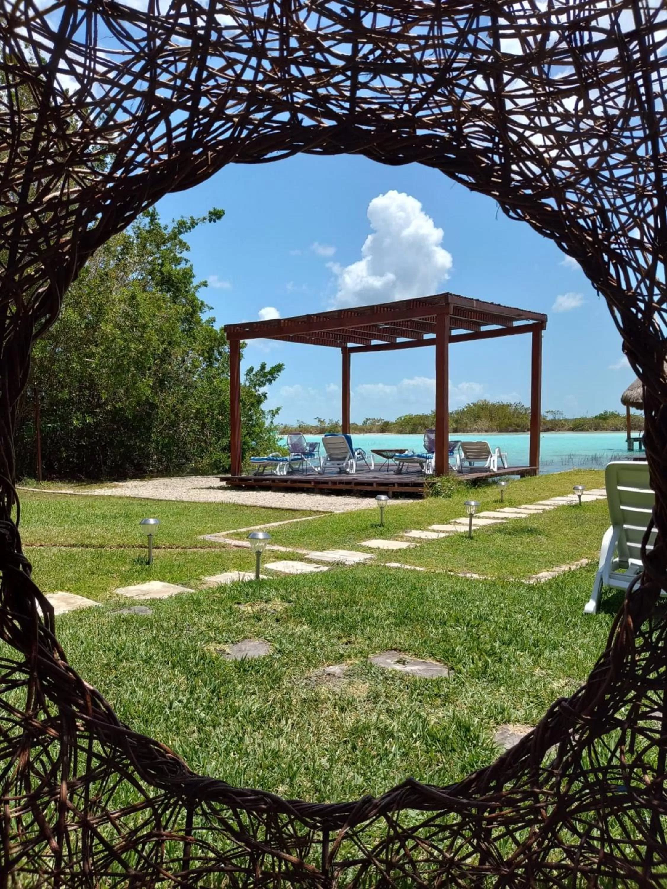 Seating area in Casa Shiva Bacalar by MIJ
