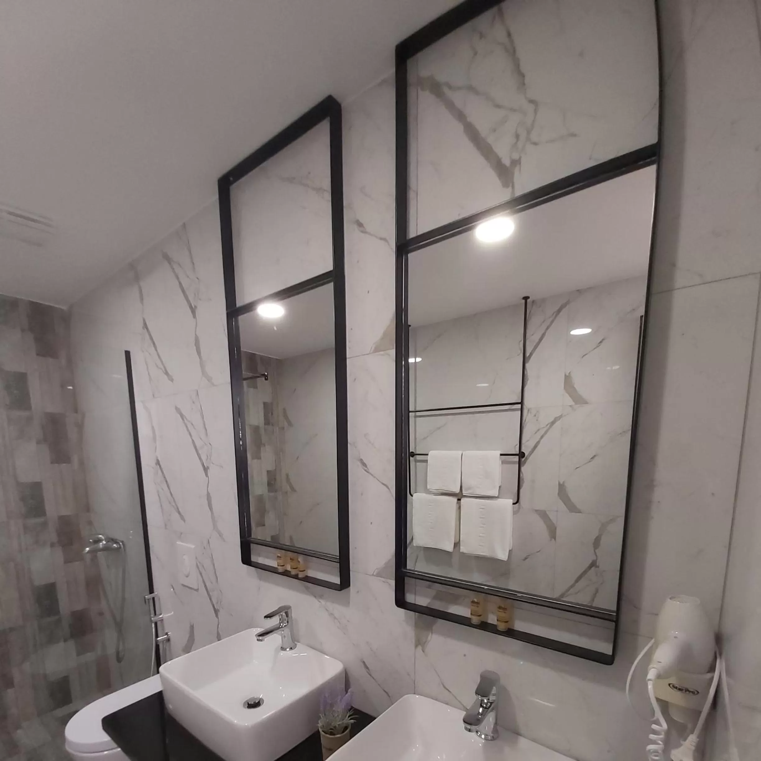 Shower in Dhima Hotel