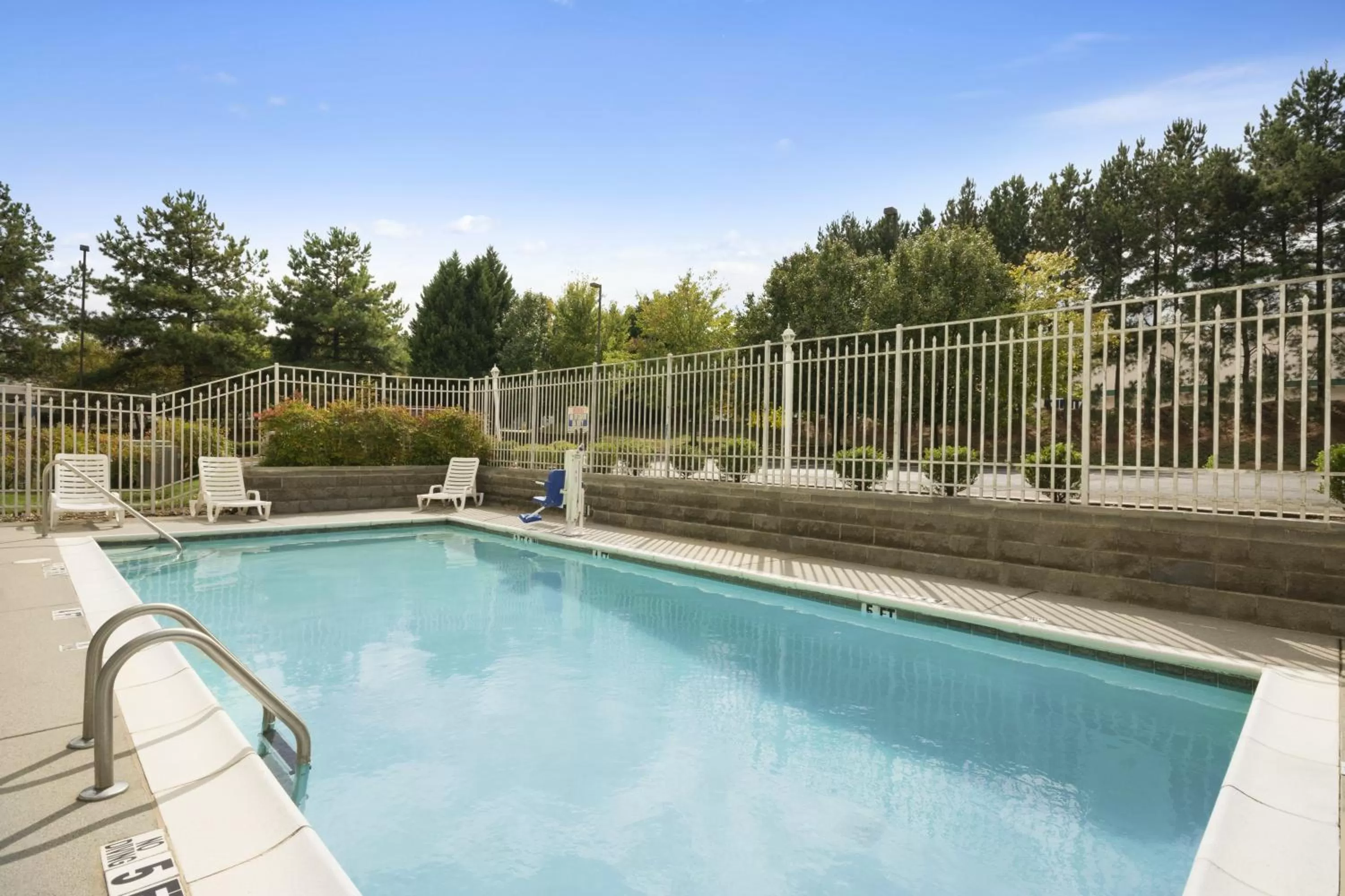 Swimming pool in Country Inn & Suites by Radisson, Norcross, GA