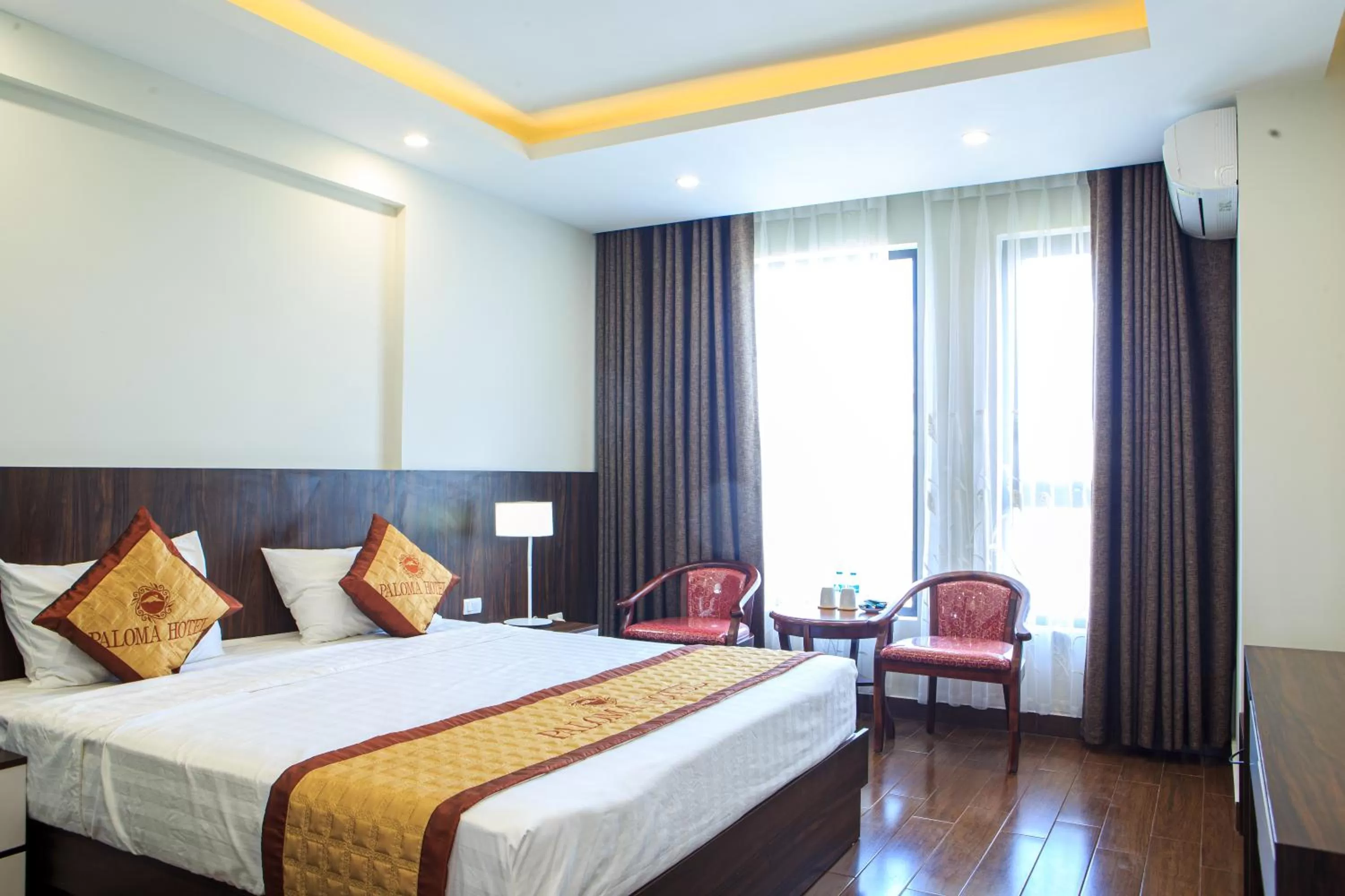 Living room, Bed in Paloma Hotel & Apartment