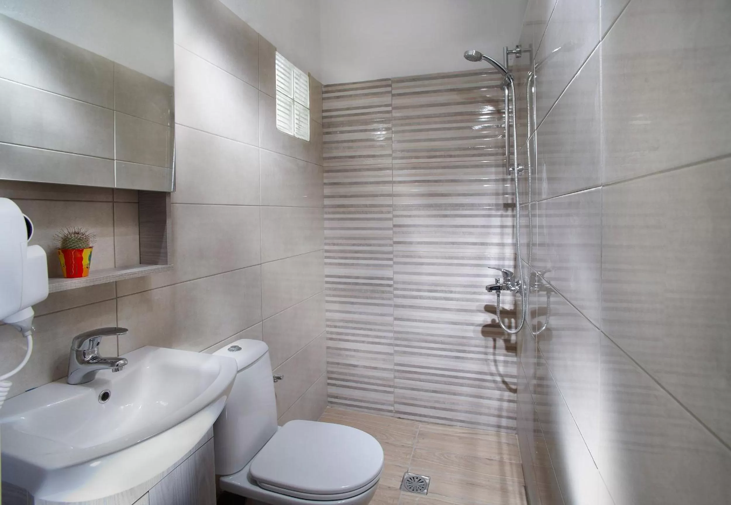 Bathroom in Faros Rooms