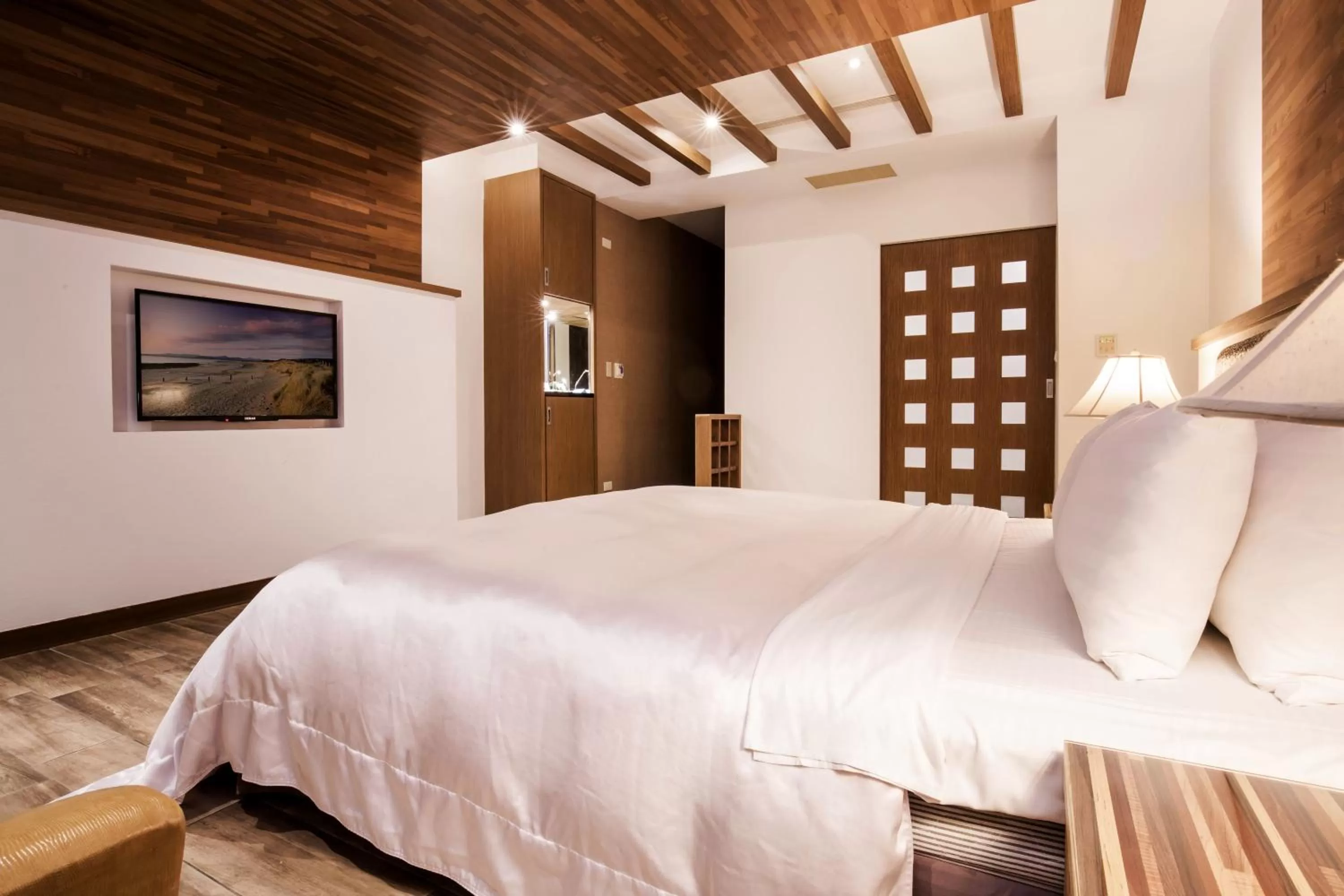 Bed in Duo Romance Hotel