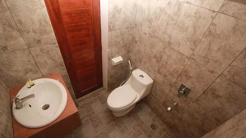 Toilet in El Nido Royal Palm Inn