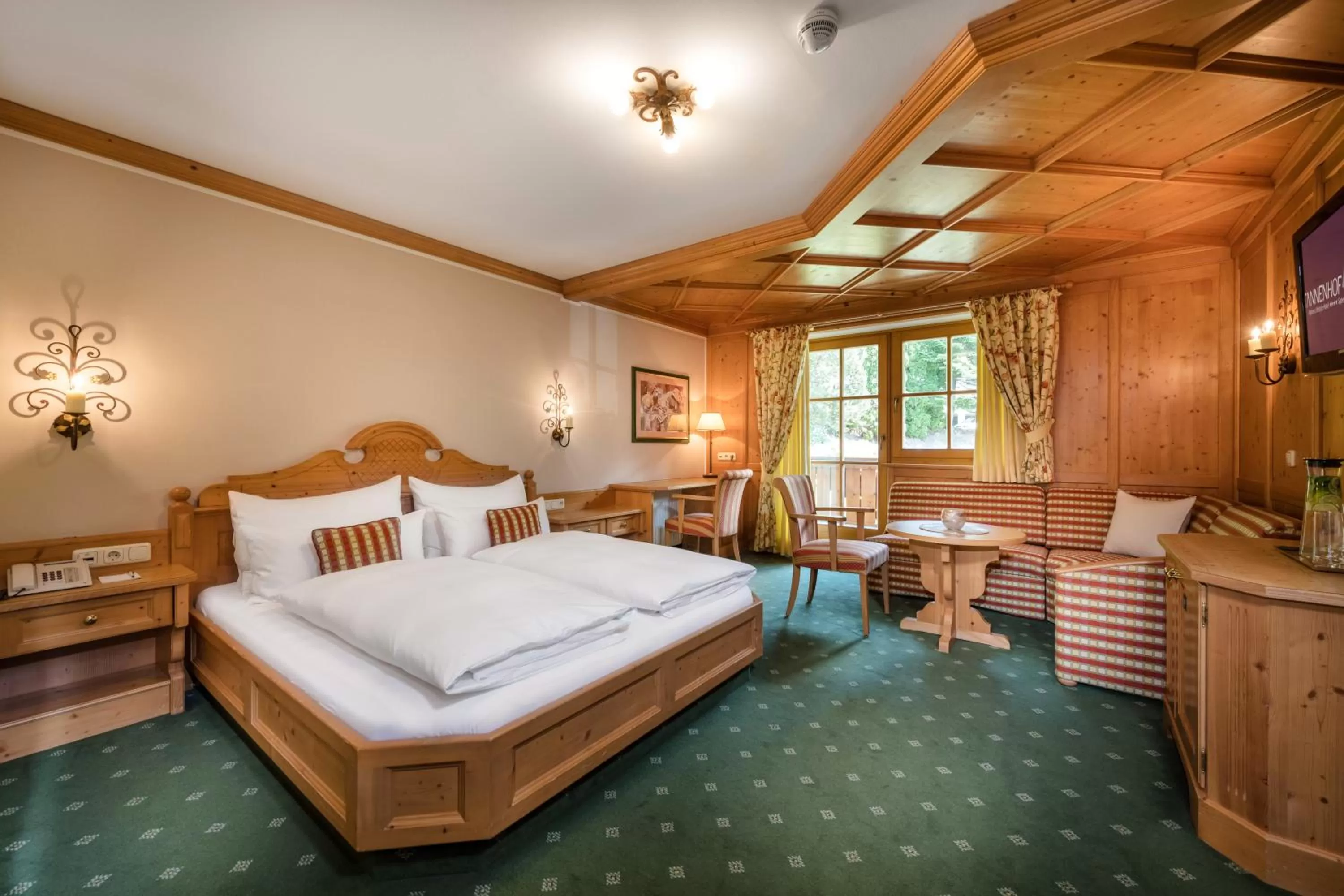 Photo of the whole room, Bed in Alpines Lifestyle Hotel Tannenhof