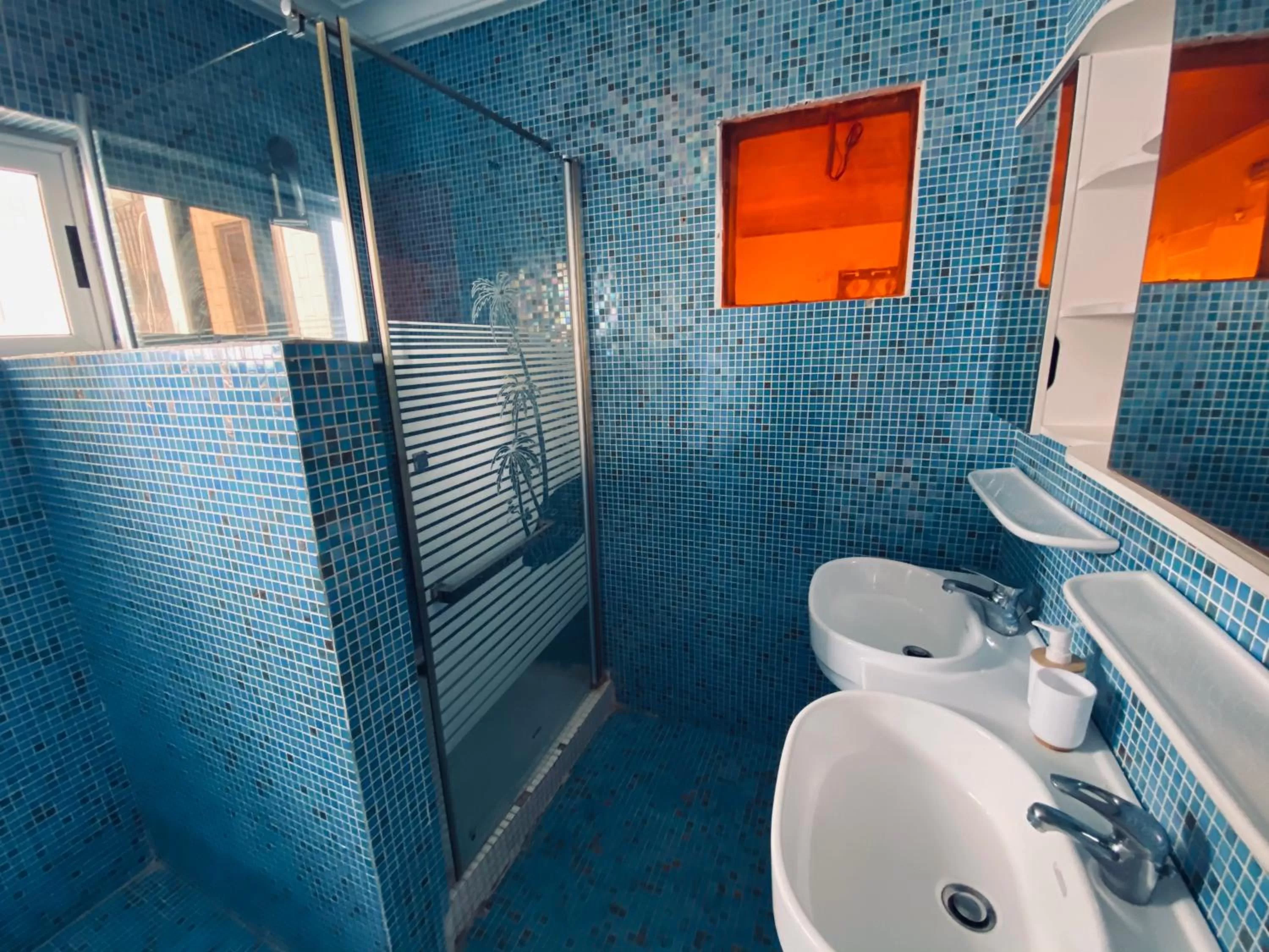 Bathroom in L'Oasis Guesthouse