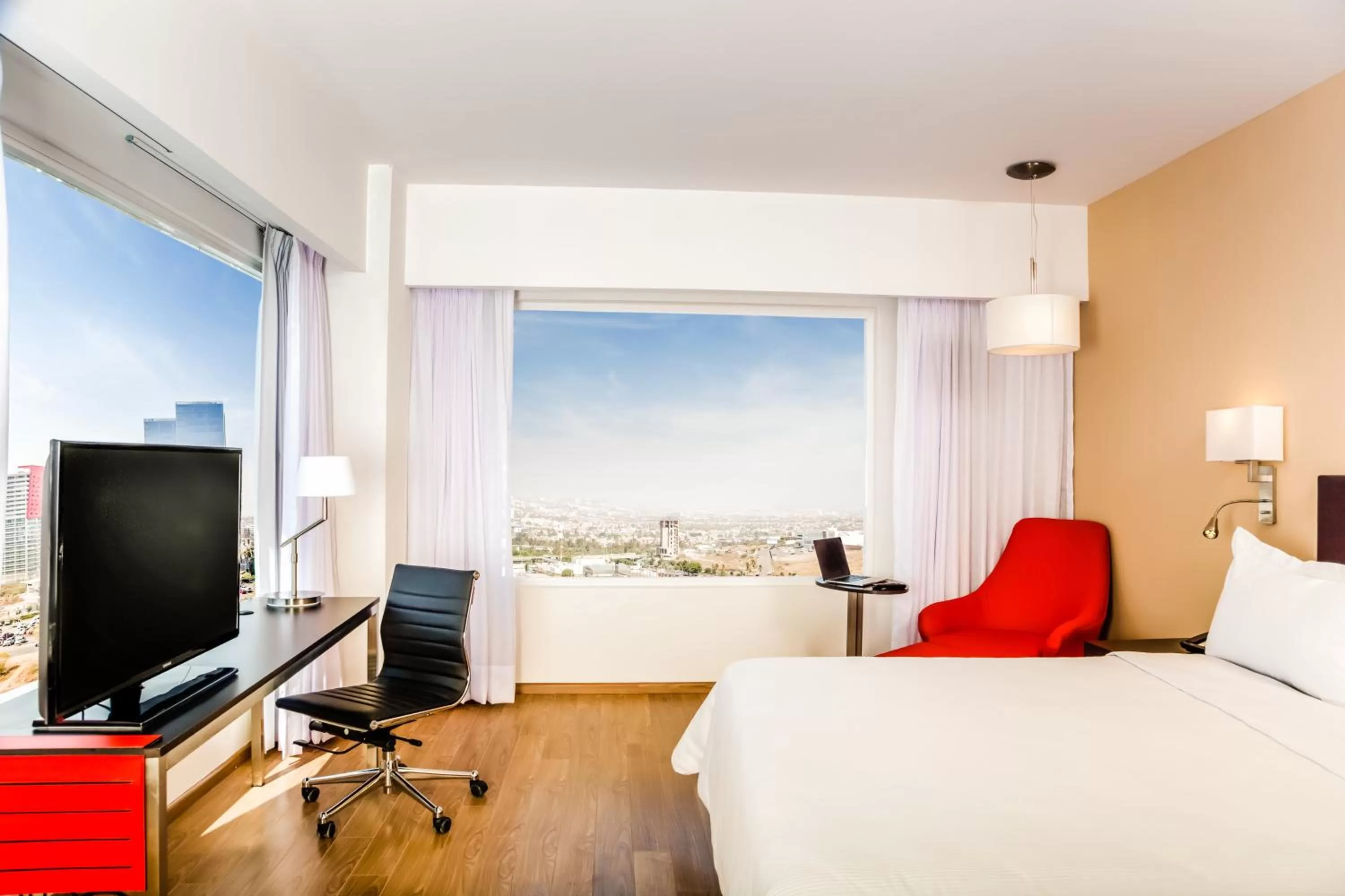 Photo of the whole room, Bed in Fiesta Inn Queretaro Centro Sur