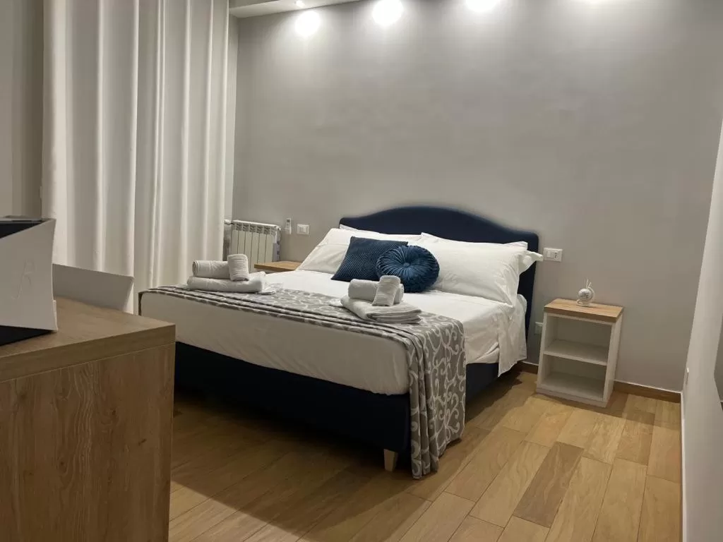 Bed in Nike Luxury Rooms