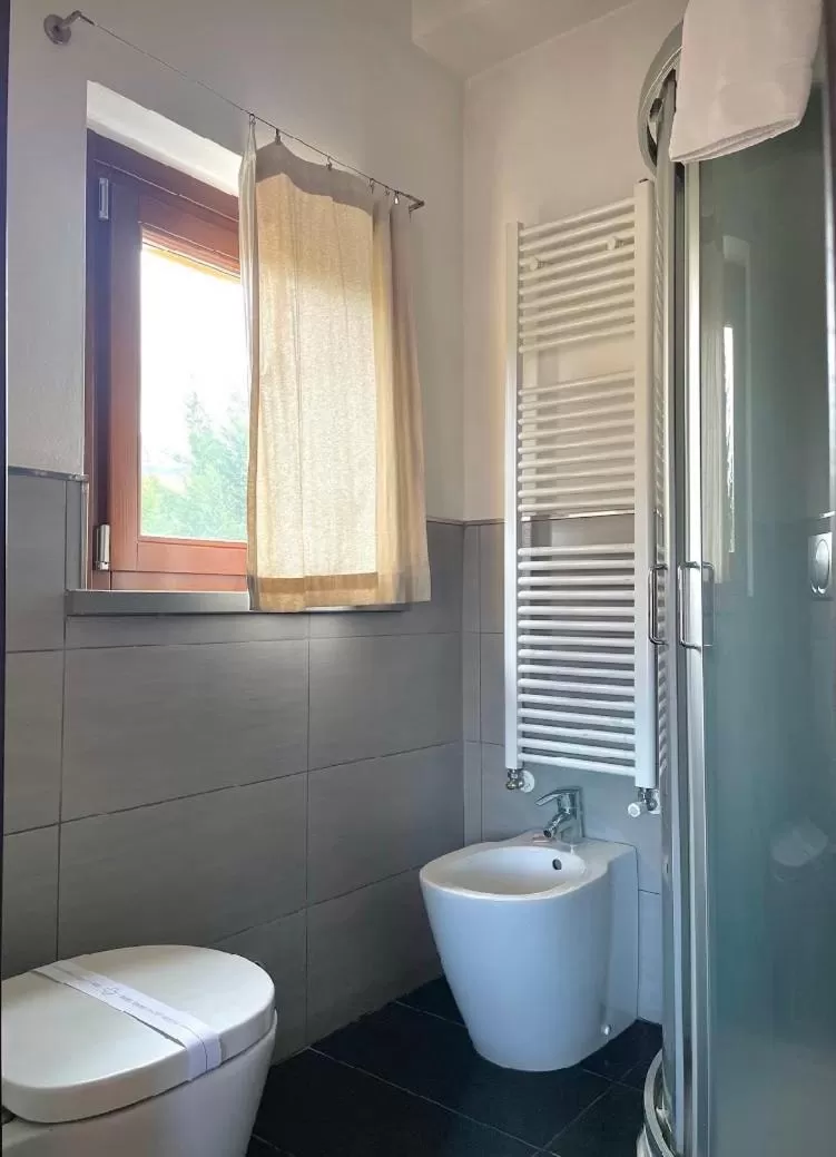 Shower in Cameracaffè sul Lago