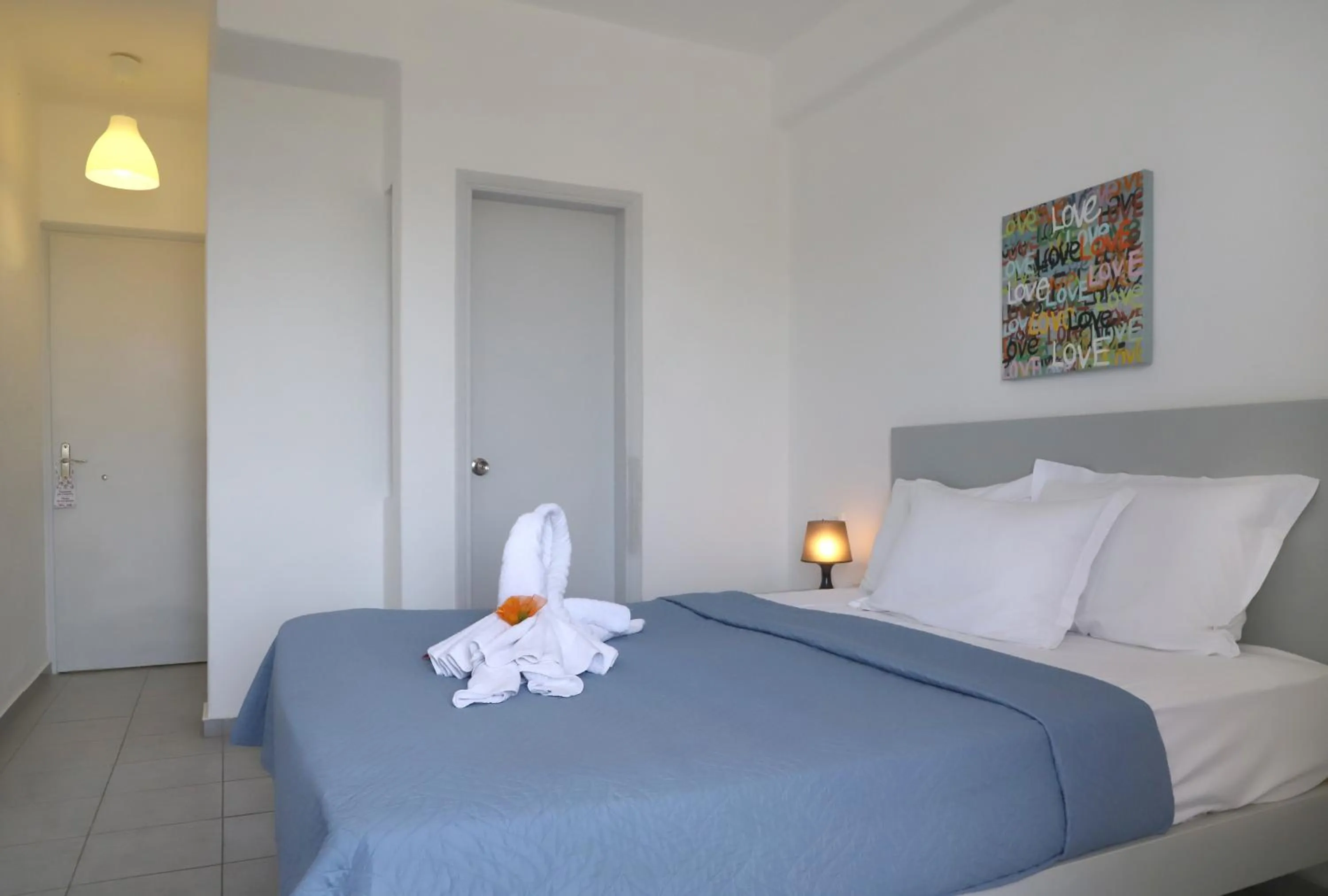 Photo of the whole room, Bed in Elounda Krini Hotel